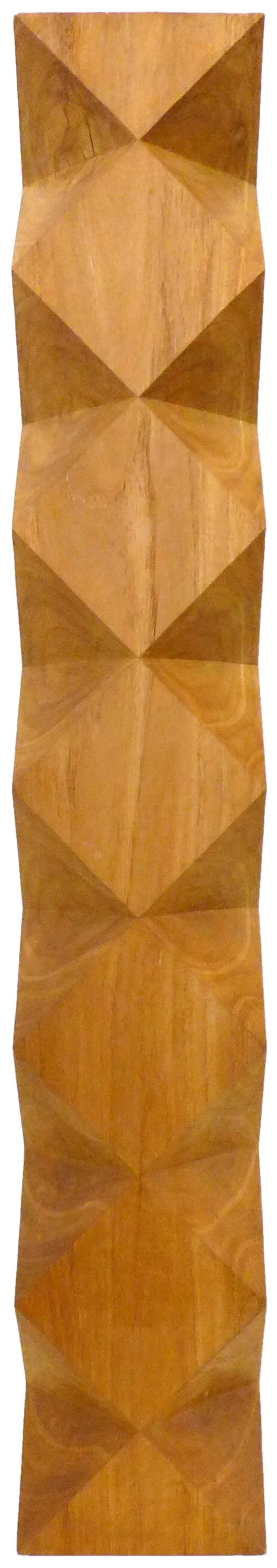 An extraordinary, chip-carved, wood totem by contemporary American artist Aleph Geddis. A beautifully executed, multifaceted form of impressive scale and exact detail. Soaked in sacred geometry; great from all angles; an impressive and powerful