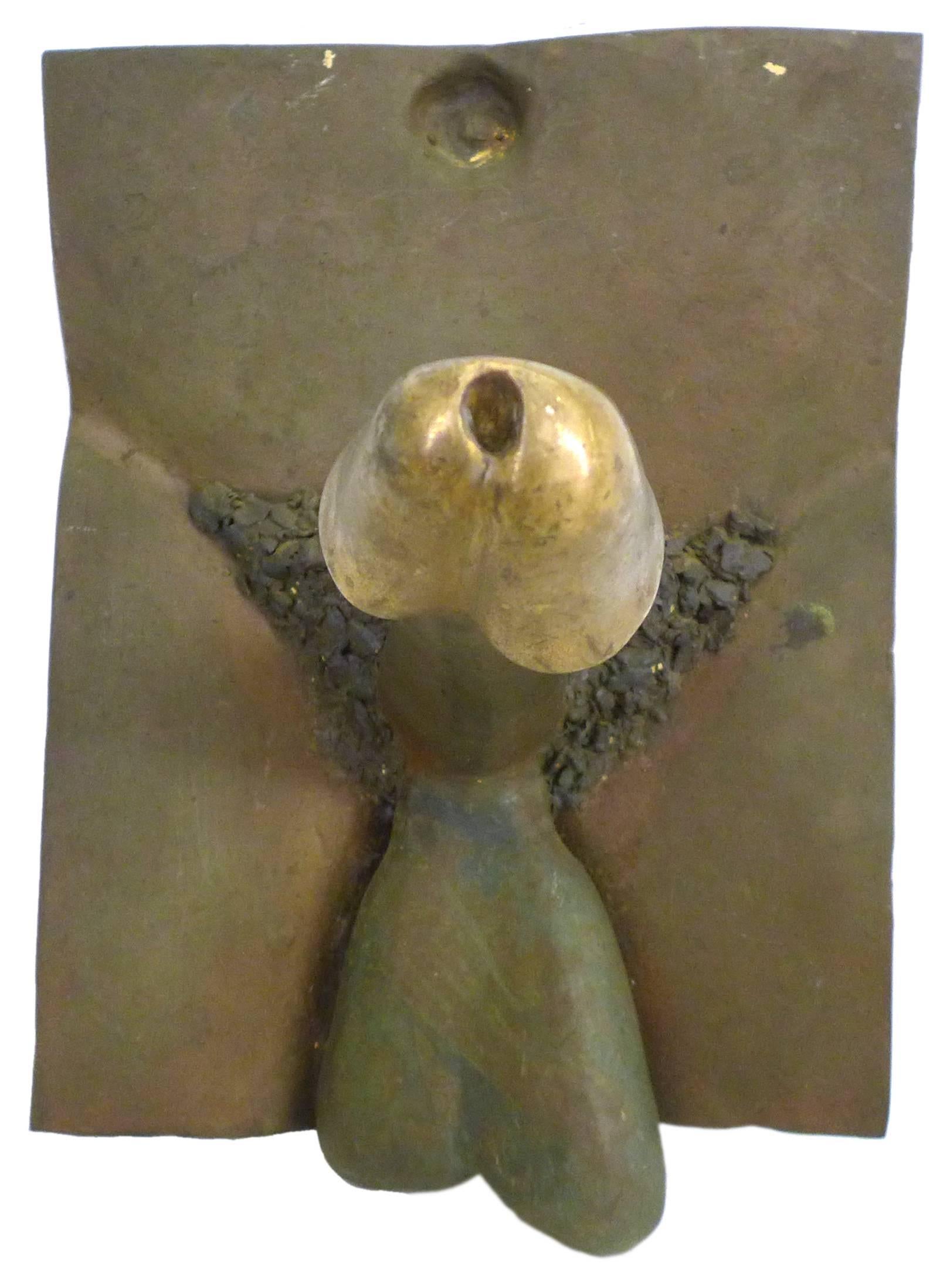 An unforgettable, cast-bronze, male-genitalia wall-hanging sculpture. A heavy-cast, comically proportioned, straight-to-the-point, figurative piece of thorough yet crude detail; starting north at the navel and heading on south as necessary. Wearing