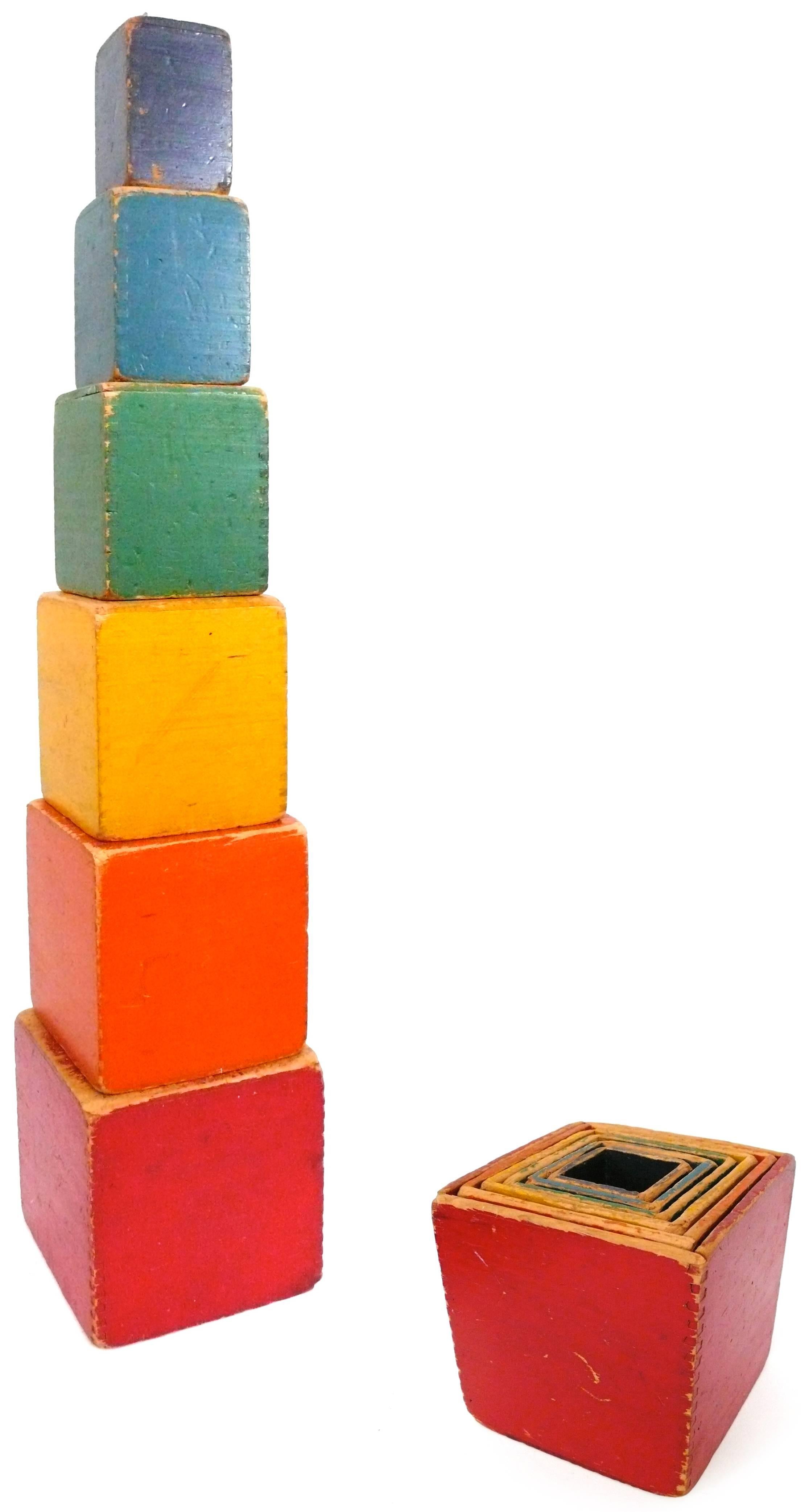 A wonderful sets of 1930's, children's nesting block sets. Beautiful, dove-tail construction and wonderfully worn, primary colors create an unusual and whimsical decorative presence for these sculptural and playful totems. 

2 sets