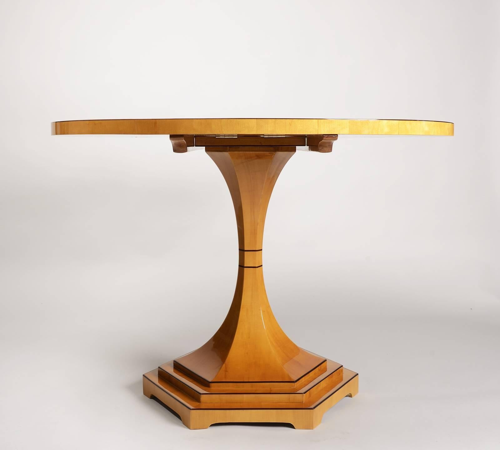 Tilt top table in maple veneer with mahogany inlays.  Iconic Vienna design of exceptional style and quality.