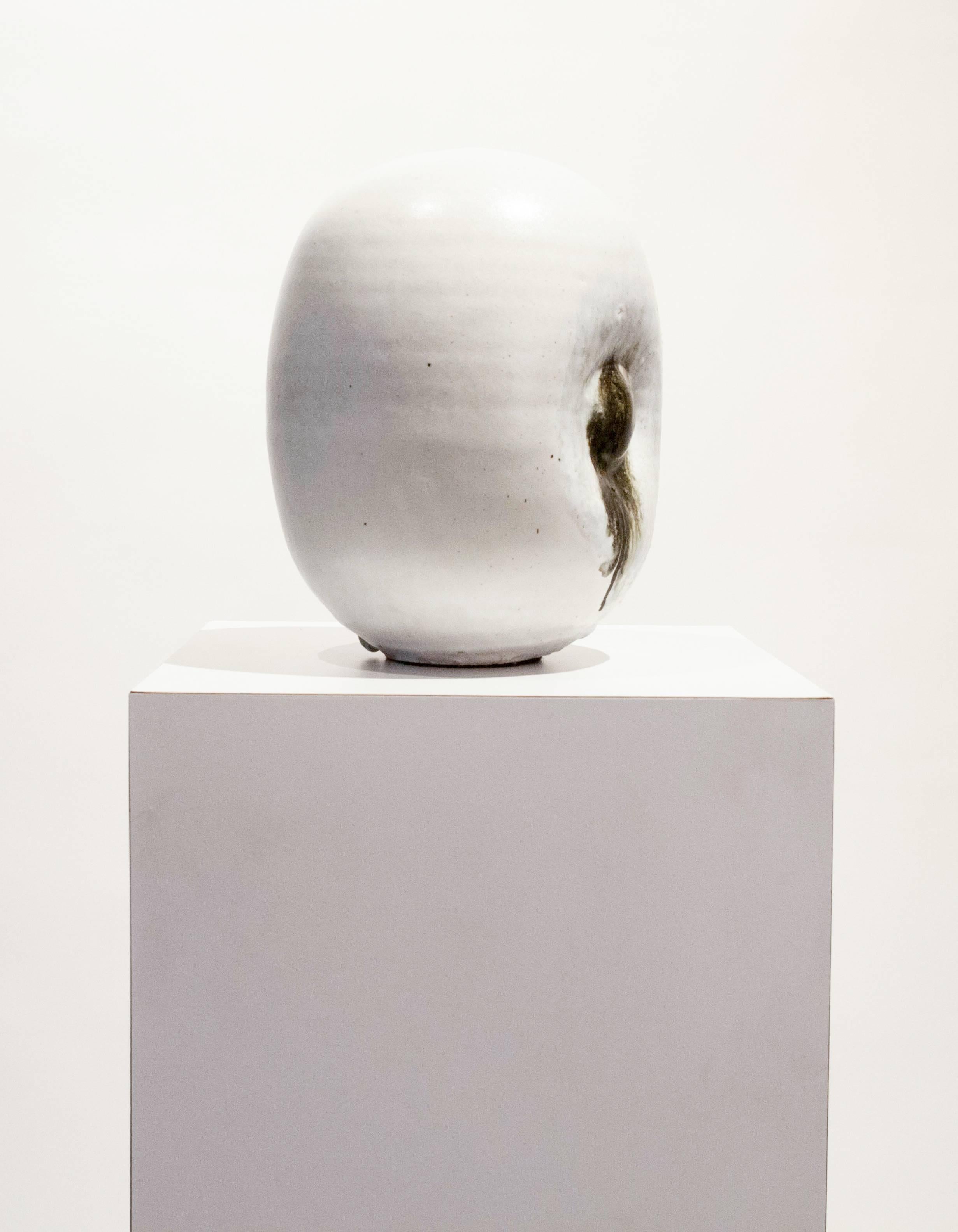 A compelling ceramic sculpture by Darcy Badiali, 2015. This head sized composition has a cycloptic 