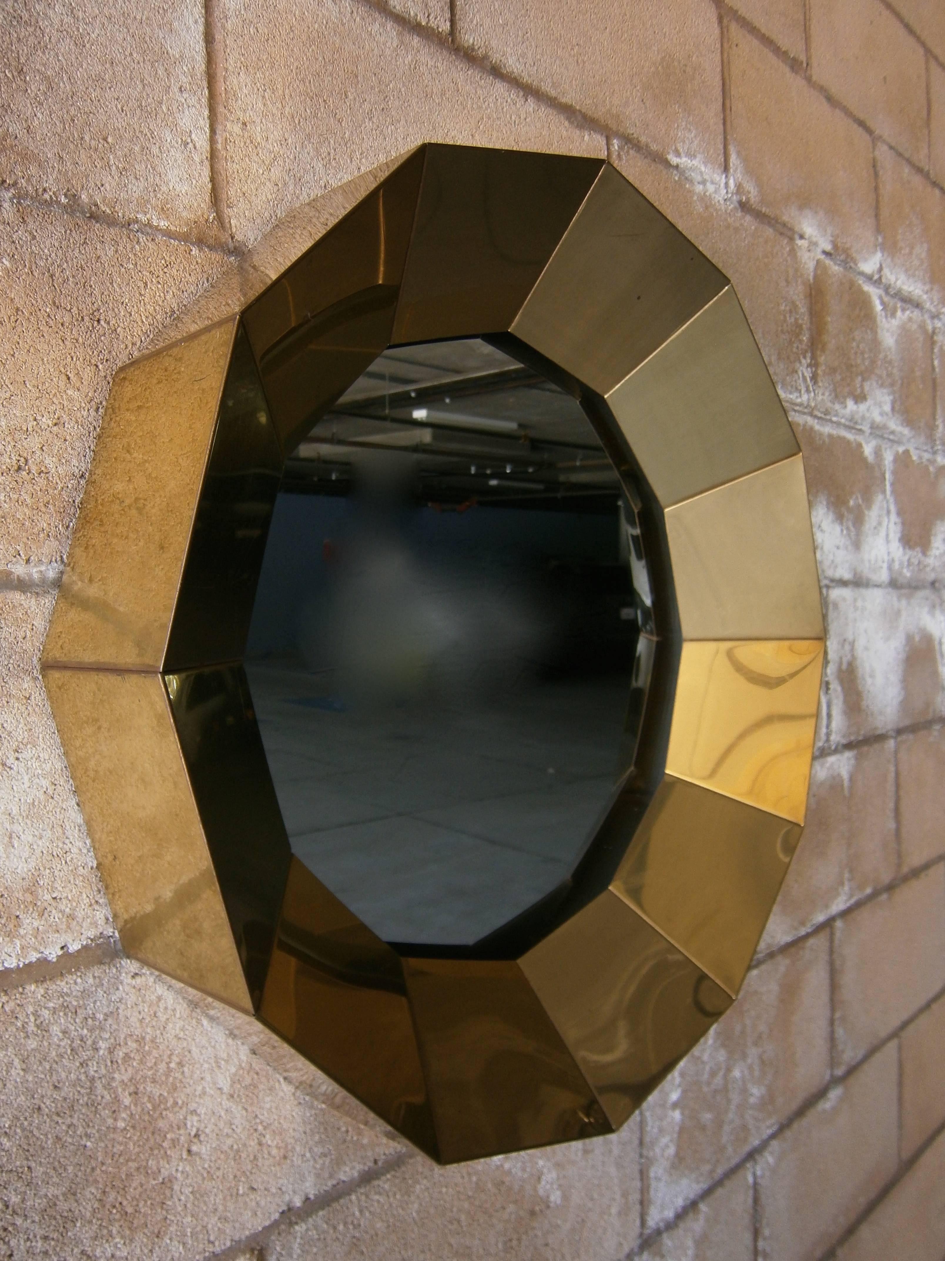 A spectacular 12 sided brass mirror by Curtis Jere, circa 1970's.  Some scuff marks in areas.