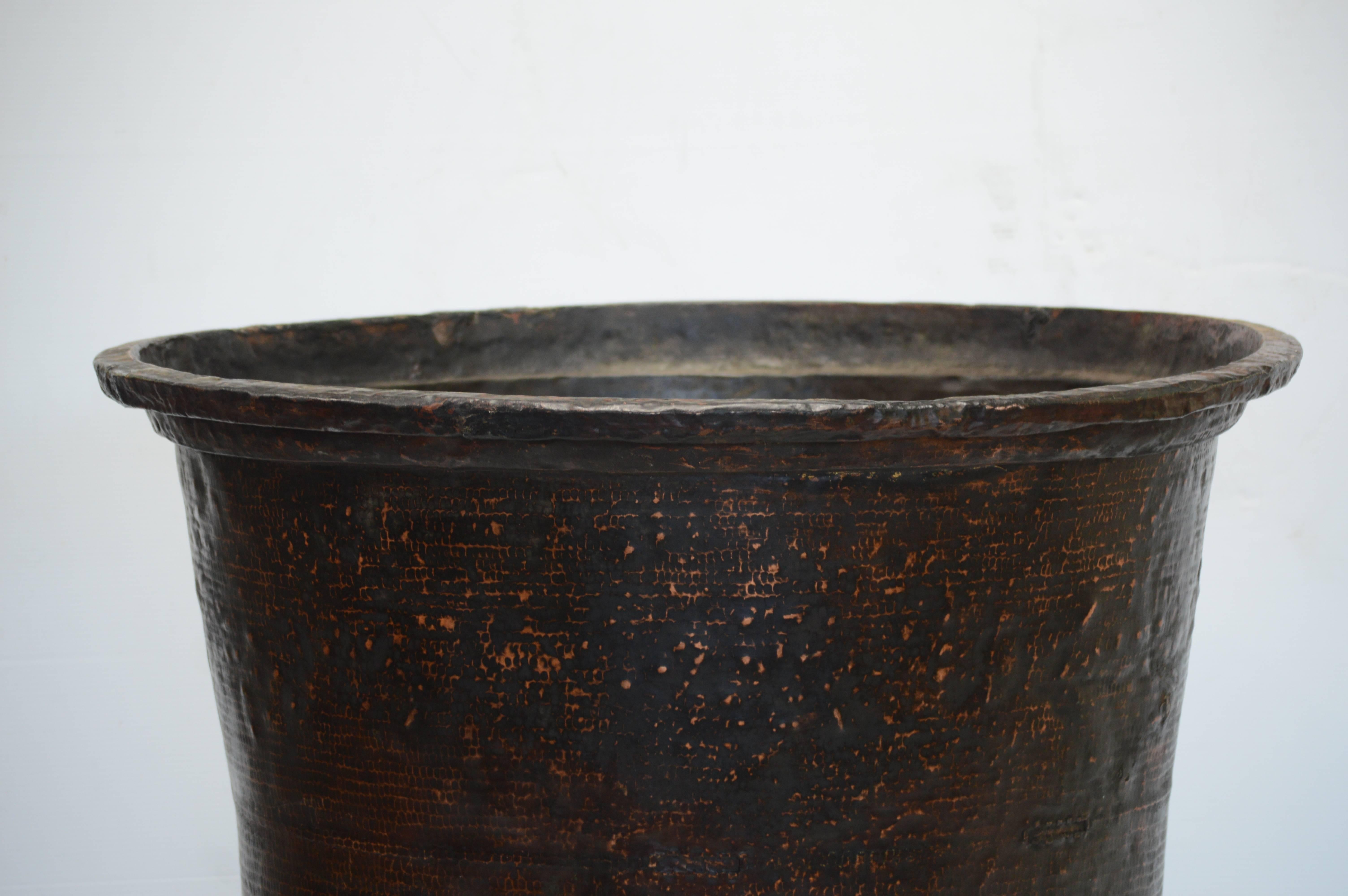 Antique vessel from Batik workshop. Handmade copper with patina of age and wear.