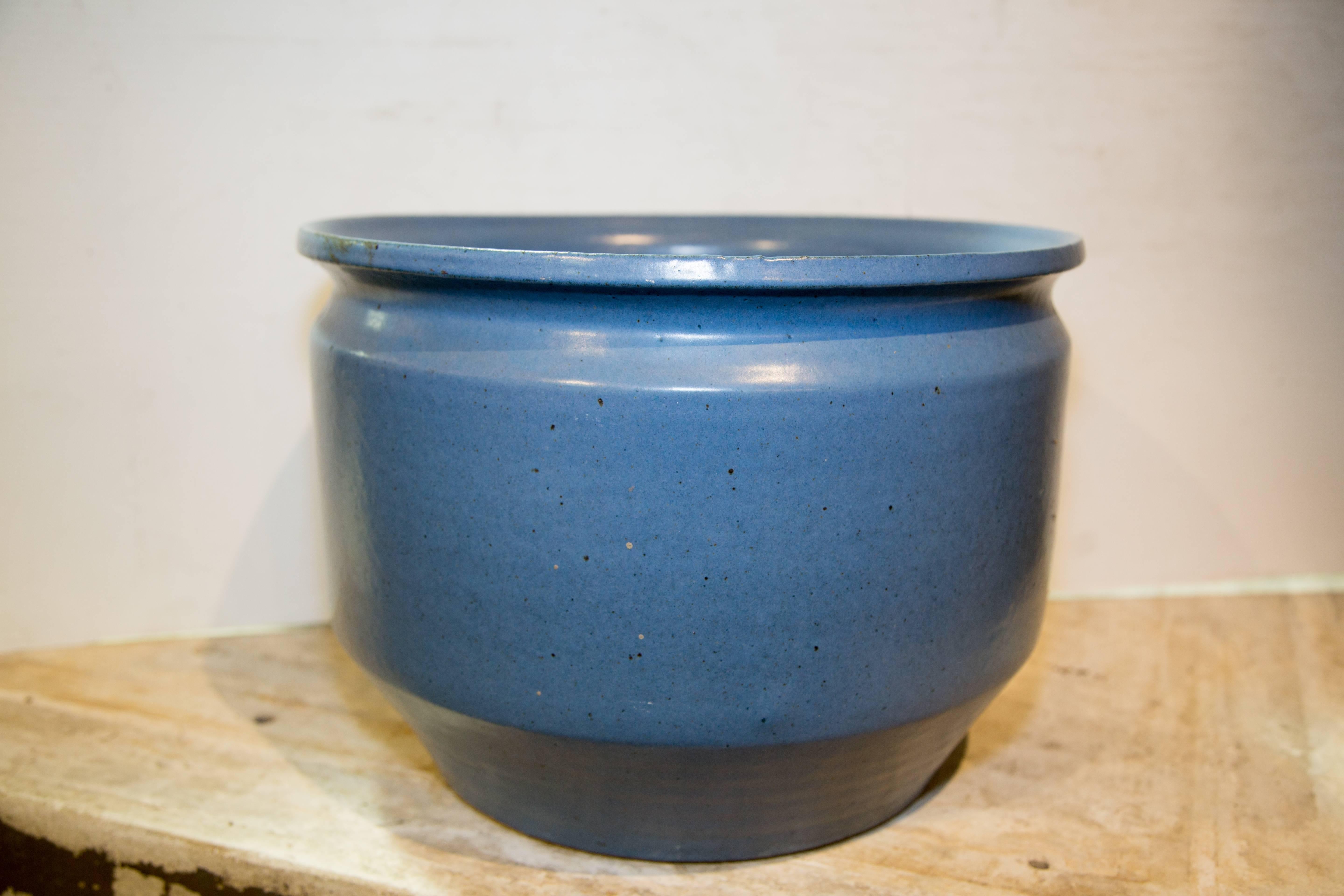 Small blue glazed planter by Earth Gender.
Mid-Century Modern,
California,
1970.
Measures: 16” D x 11.5” H.
$3,750.00.