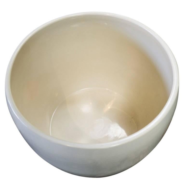 white glazed ceramic pots