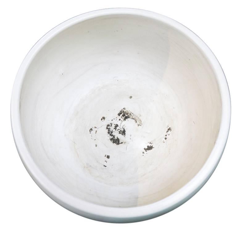 A design born in circa 1950 when modern art for the garden was experiencing a boom in California thanks in part to Rita and Max Lawrence founding of the company Architectural Pottery. This John Follis designed bowl features a 12 inch diameter and a