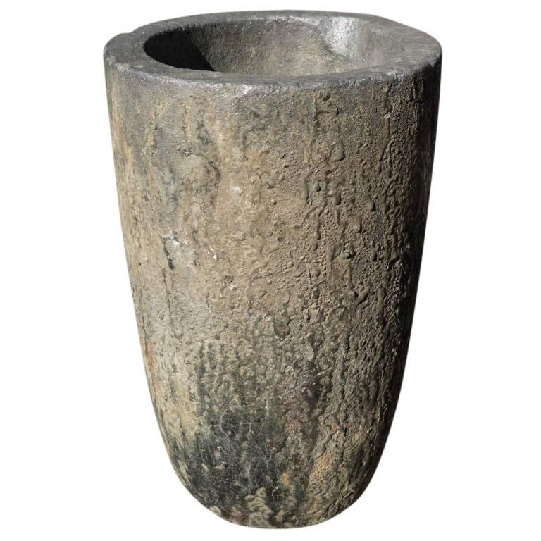 This charming and small slag pot is only 12 inches in Diameter and 19 inches tall, a perfect size for adding texture to your interior design. A rich blend of minerals and heat induced stress wrinkles synonymous with slag pots give this small planter