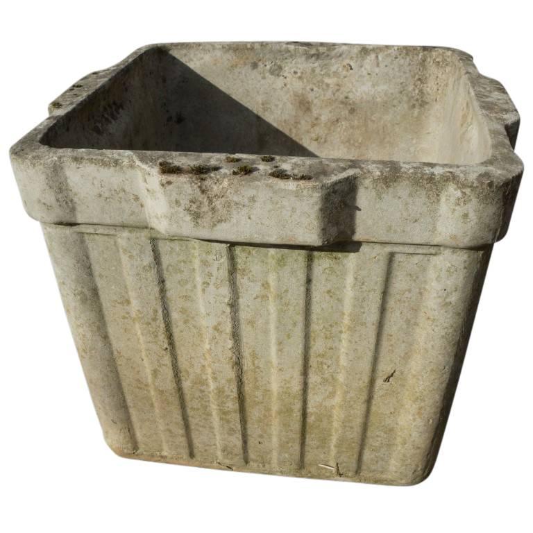 These charming box planters are available individually or in sets of up to 12. For use in landscape or interior garden design, these cement box planters have a ribbed outside, and protruding handles on the top lip. Minimal and lovely, born during