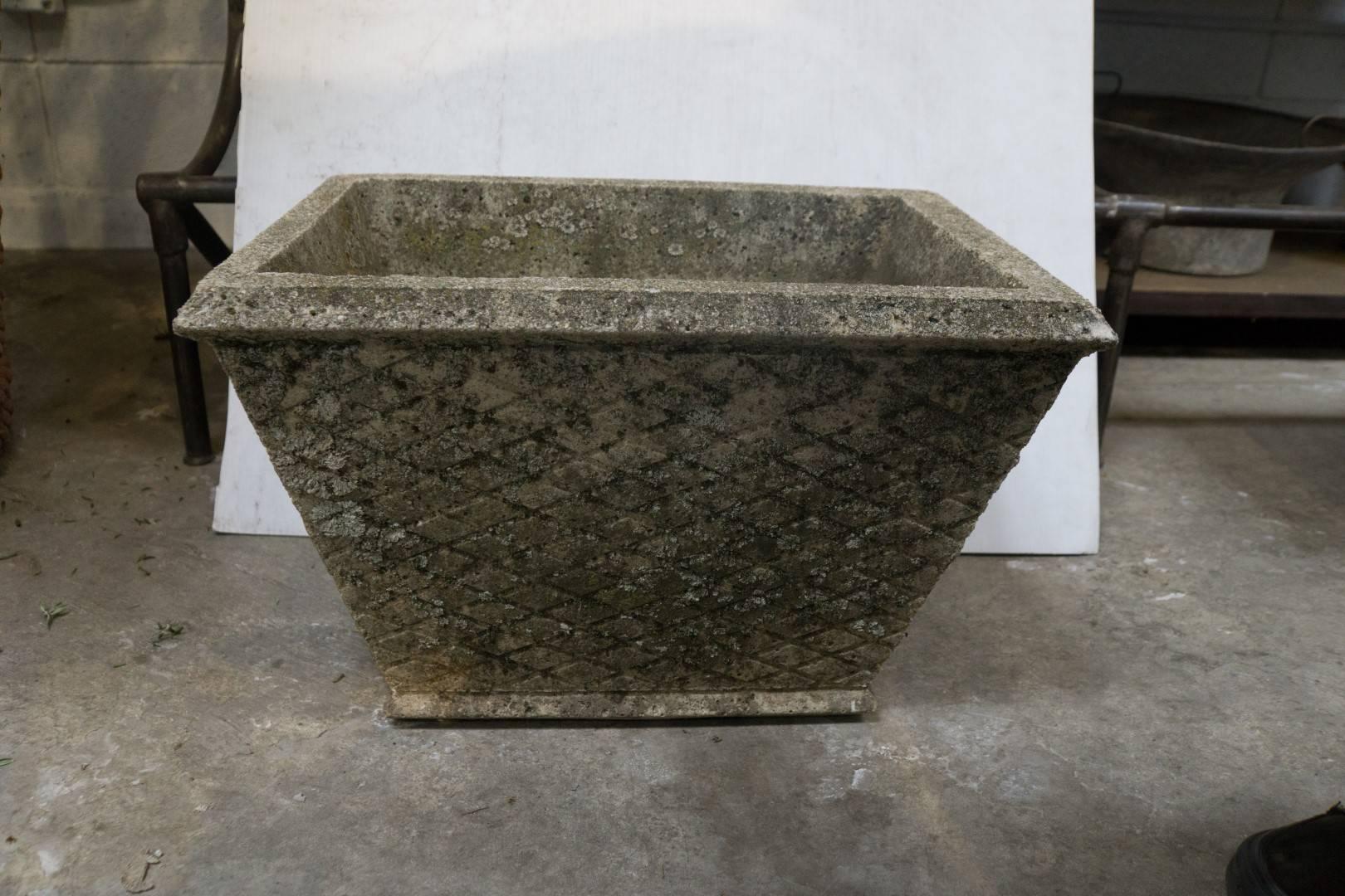 20th century French cast stone planter with intricate basket weave design
circa 1910
France
Measures: 19'' L x 13'' W x 12'' H
$450.00.