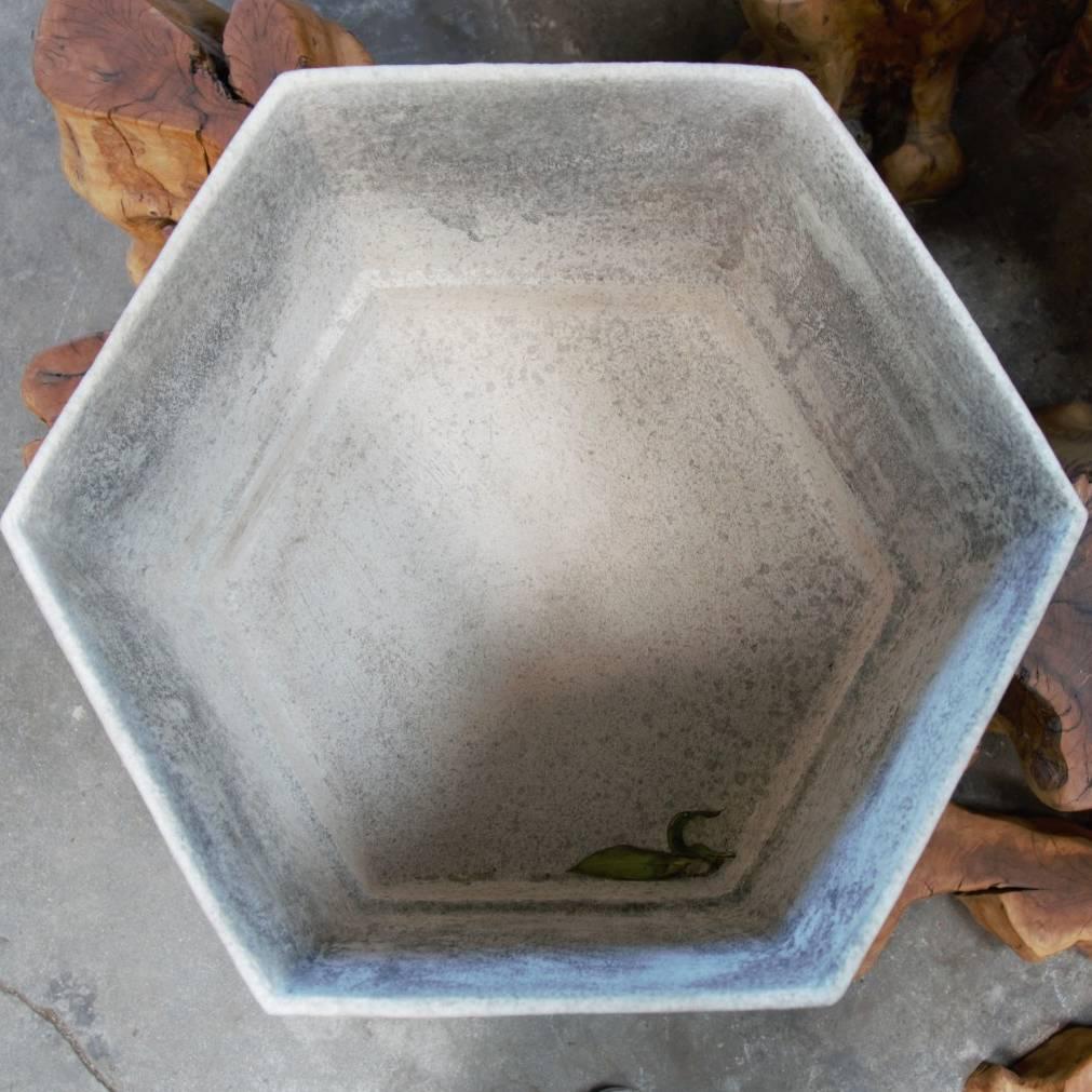 Two-hex planter. Cast composite stone planter with applied finish. Color is hand-finish and can vary.
