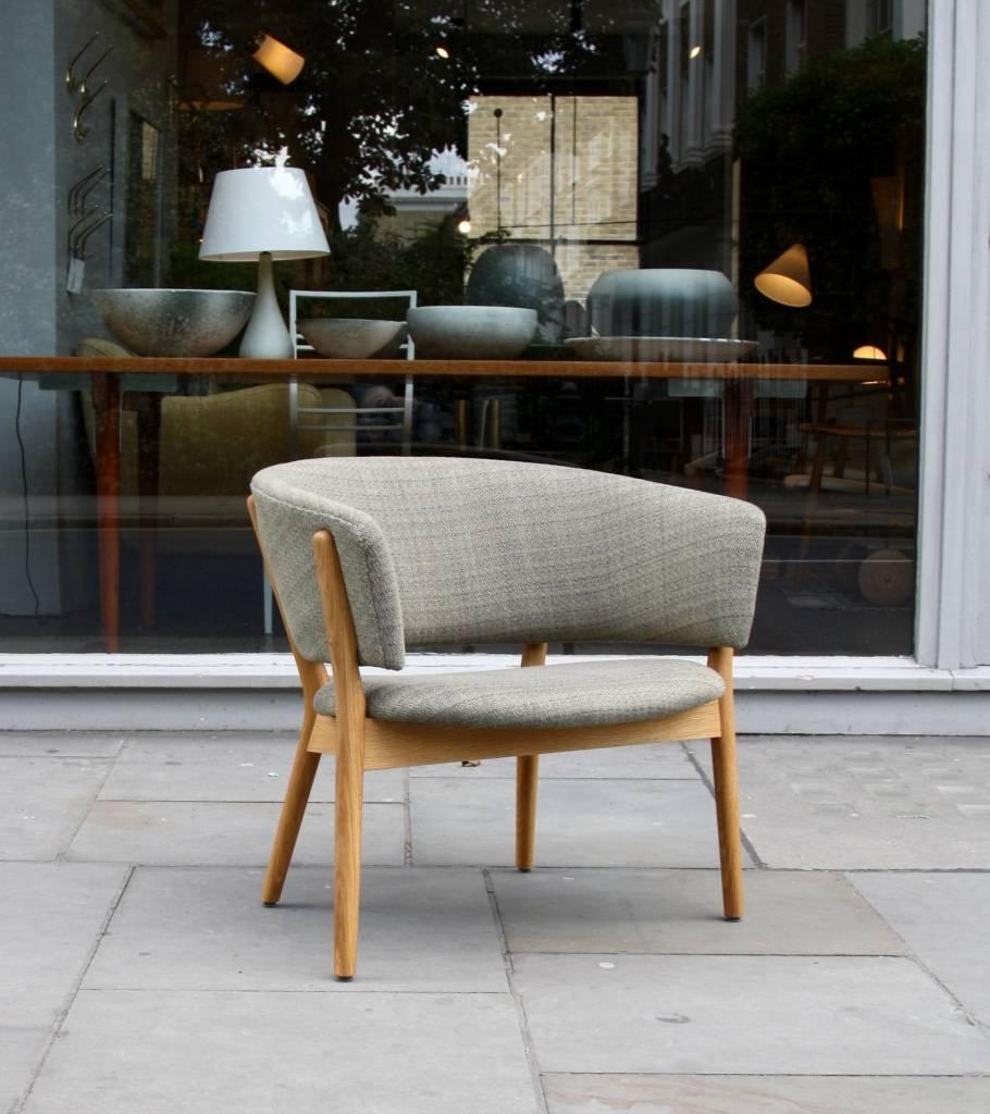 A new, cabinet made, ND83 armchair in oiled oak with handwoven upholstery.
The ND83 was designed in 1952 by Nanna Ditzel and is still made-to-order today by skilled cabinetmakers at Snedkergården Møbler.

The structure of the chair is made