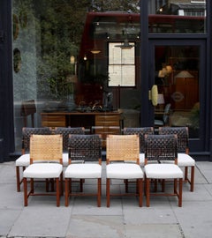 Carl-Gustav Hiort af Ornäs 1950s Set of Six or Eight Cane/Leather Dining Chairs