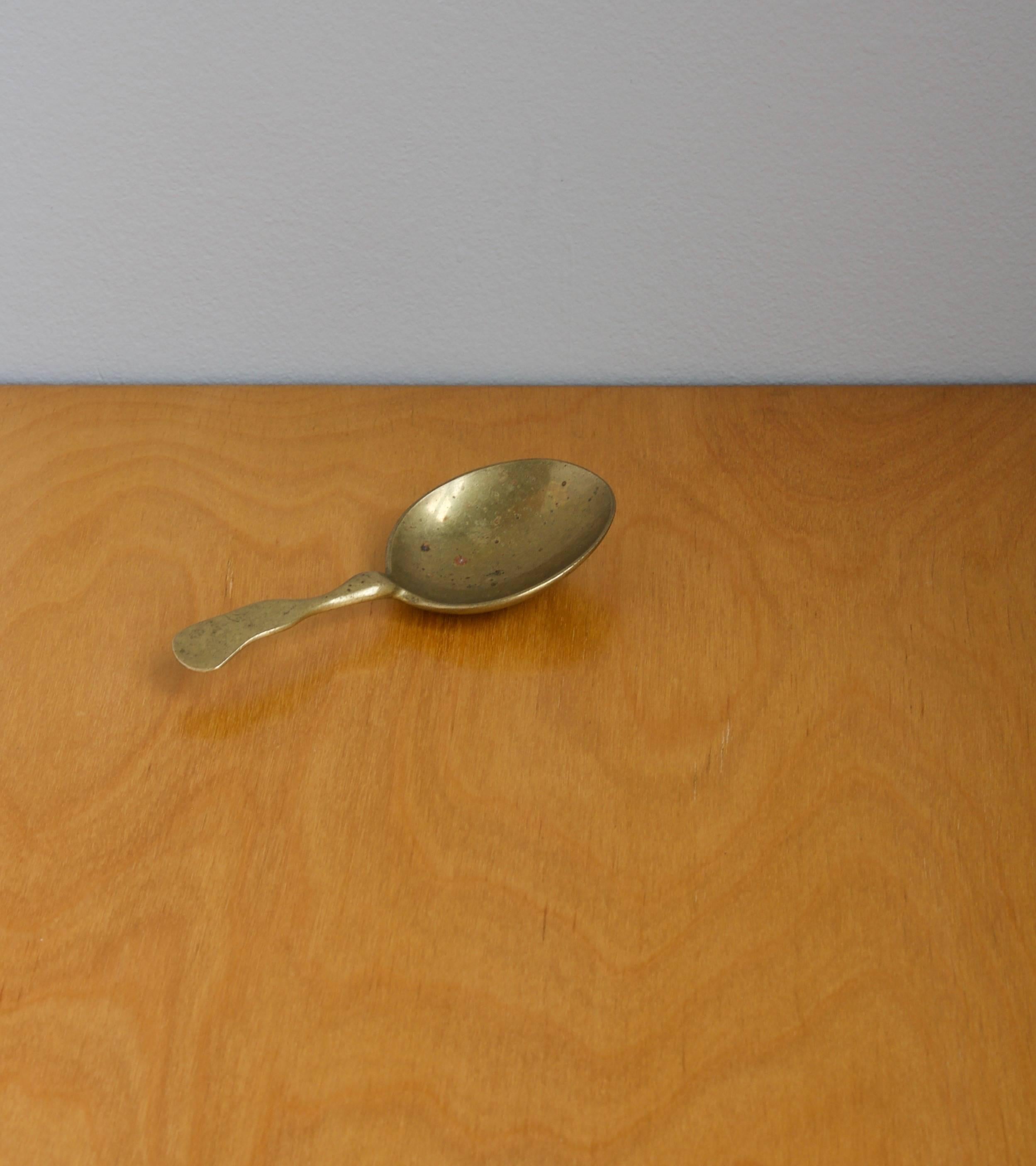 vintage brass spoon