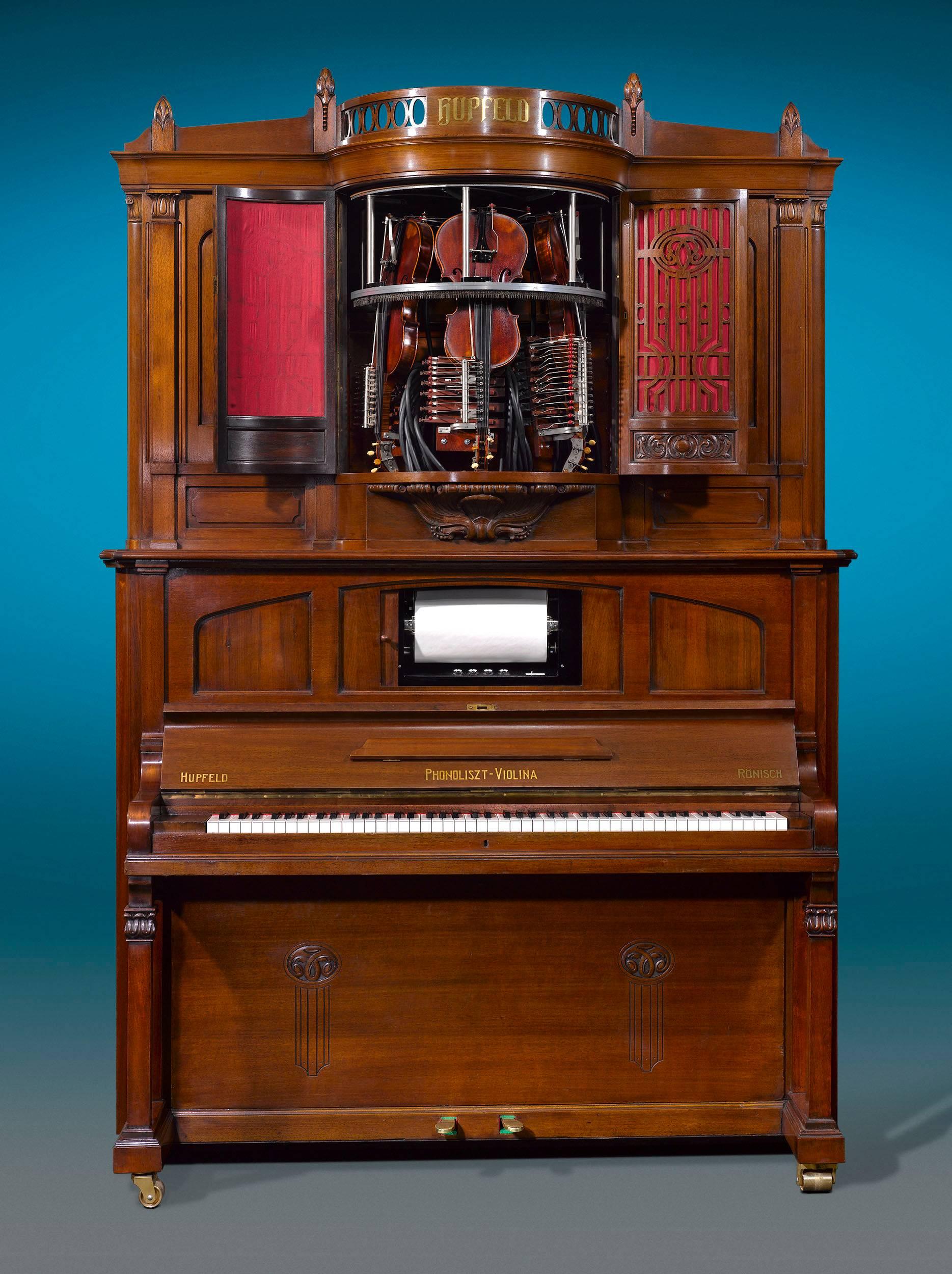 Dieser unglaubliche Hupfeld Phonoliszt-Violina Model B Musikschrank gehört zu den seltensten und fortschrittlichsten automatischen Musikspielern seiner Zeit. Die bemerkenswerte Maschine, die von der renommierten Leipziger Firma Ludwig Hupfeld