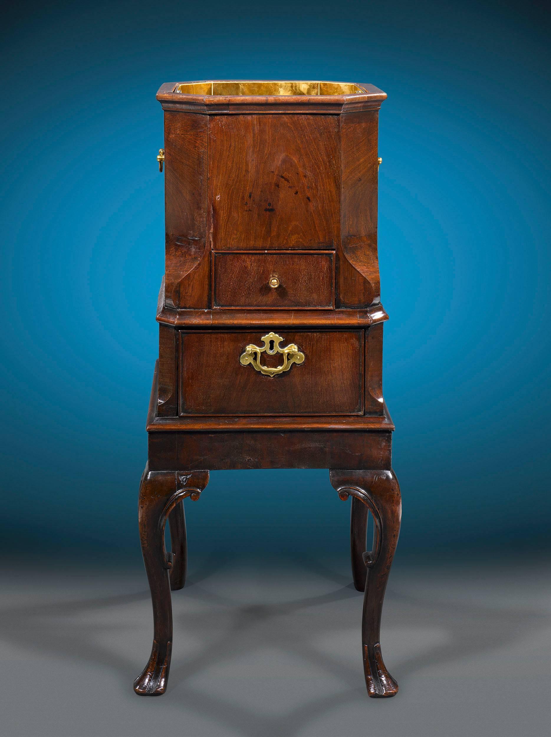 This rare 18th century Irish wine cellarette, or cooler, is crafted of rich mahogany in a Classic style. Boasting beautifully carved details and an elegant form, this cellarette is a superb example of Irish Chippendale furniture at its finest. Both