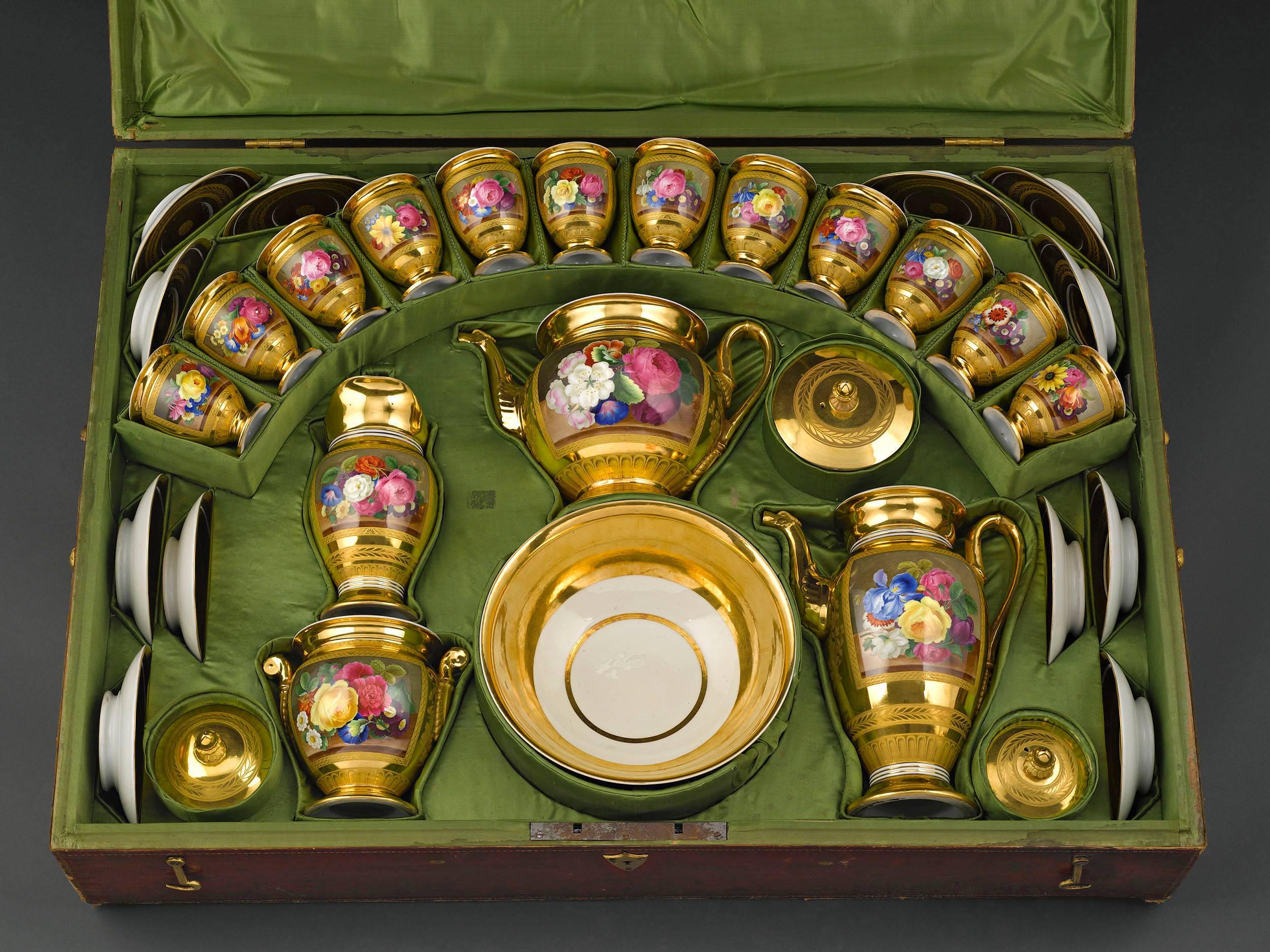 This rare and extensive Meissen porcelain tea and coffee service displays exceptional artistry. Each of the 39 exquisite pieces features delicately hand-painted cartouches of the popular “Meissen Rose” within a floral still-life. Each unique