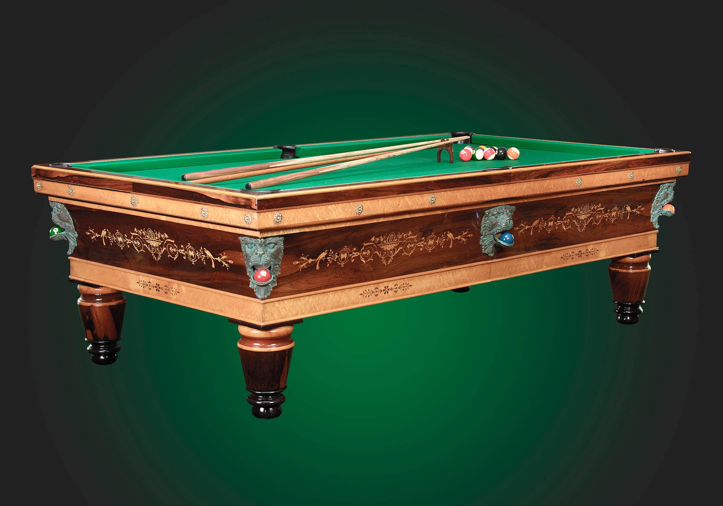 This exquisite Charles X billiard table is an early example of the fine billiard tables produced by the Chevillotte firm of Orleans, France. The table is crafted of rosewood and bird’s eye maple with exotic, intricate wood inlay and adorned with