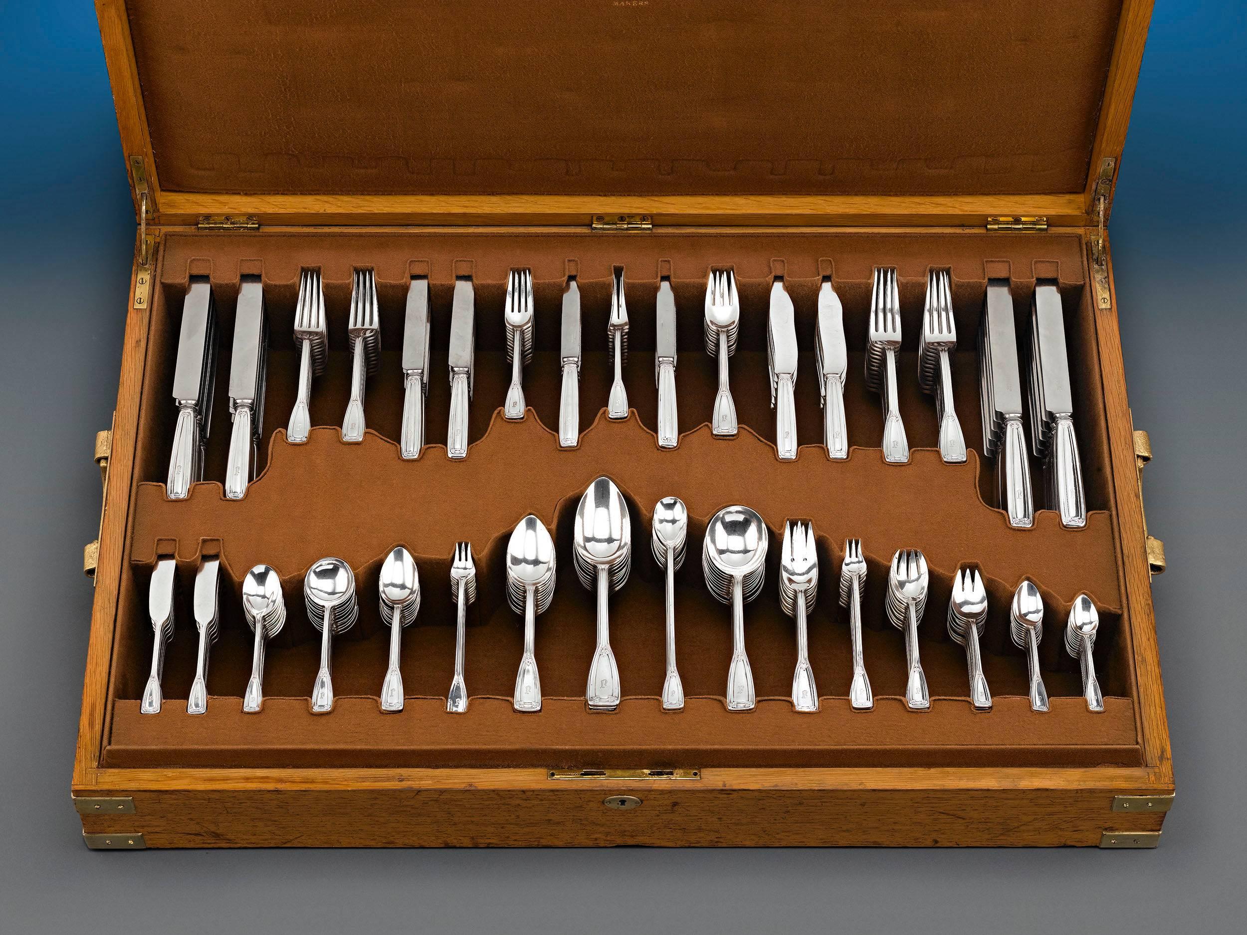 This magnificent antique 324-piece Tiffany & Co. sterling flatware service boasts the classic St. Dunstan pattern. Patented in 1909, this well-loved design is named for St. Dunstan, the patron saint of gold and silversmiths. It exhibits a subtle