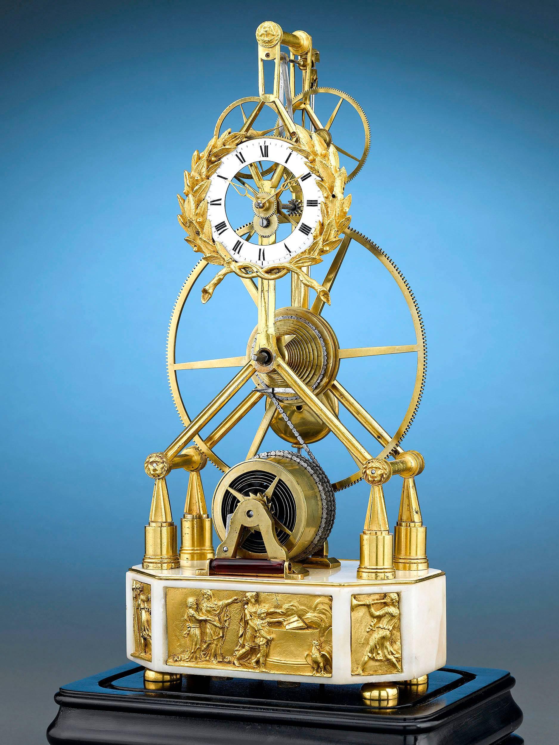 A captivating French great wheel skeleton clock in the Empire style. This clock features a large or 