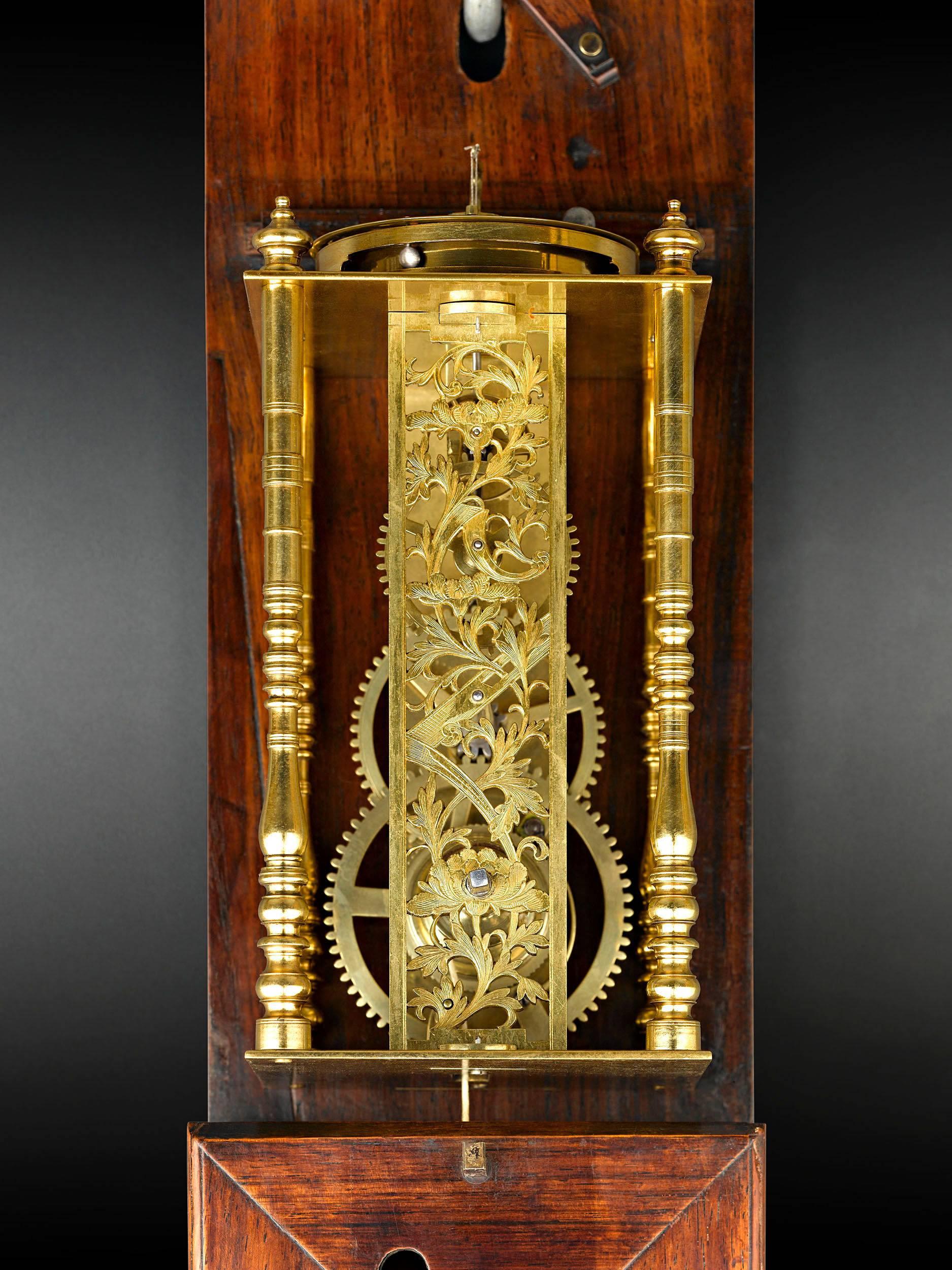 This exceptional, working Edo-period striking wall clock, or Shaku-Dokei, exemplifies the best of 19th century Japanese design. One of the largest Shitan clocks known, it measures time with a balance/verge movement, a type of movement which predated