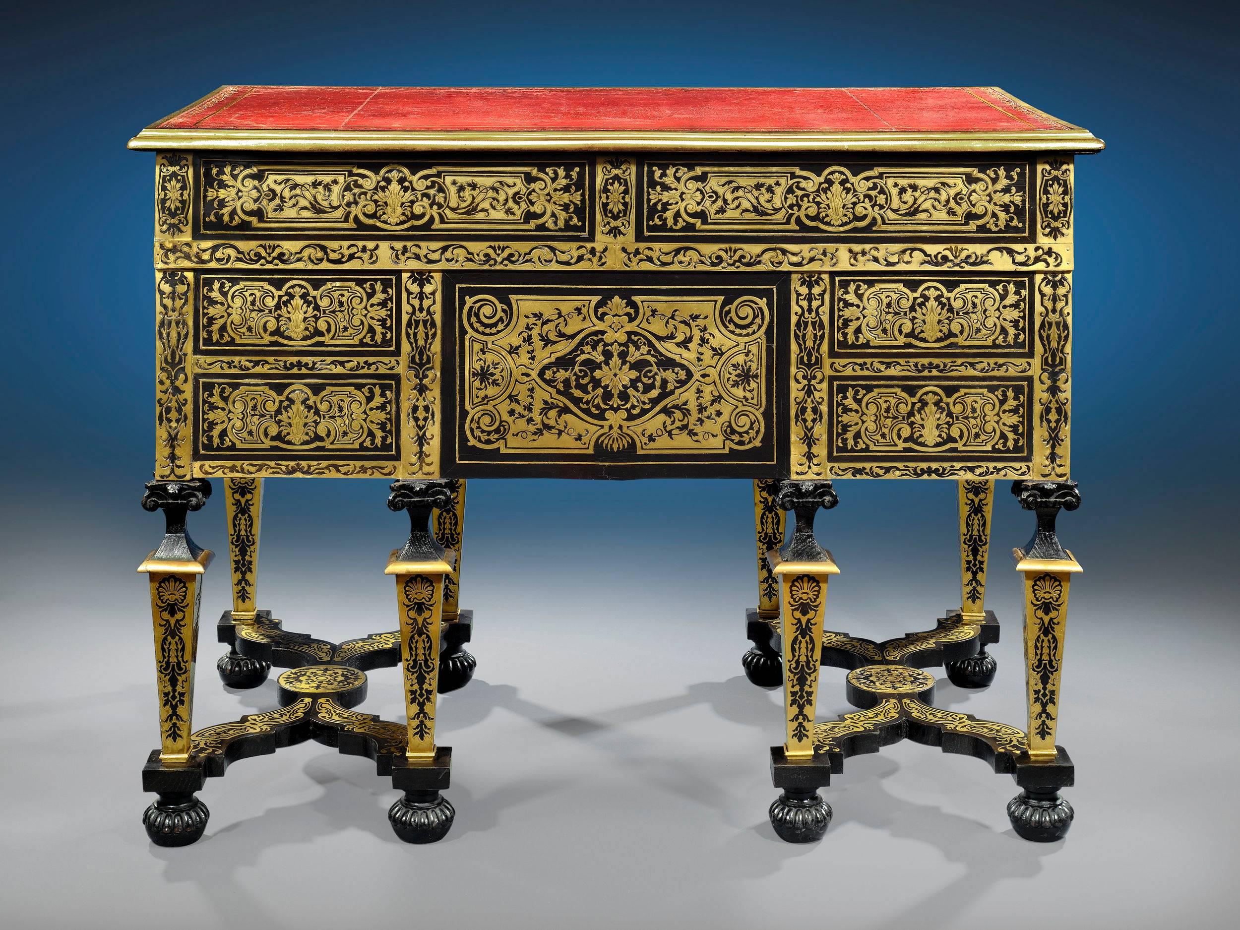 This wonderful French desk is decorated in the exquisite tortoiseshell-and-bronze inlay style perfected by celebrated ebeniste André-Charles Boulle. Displaying some of the finest craftsmanship of the 19th century, this desk is a testament to
