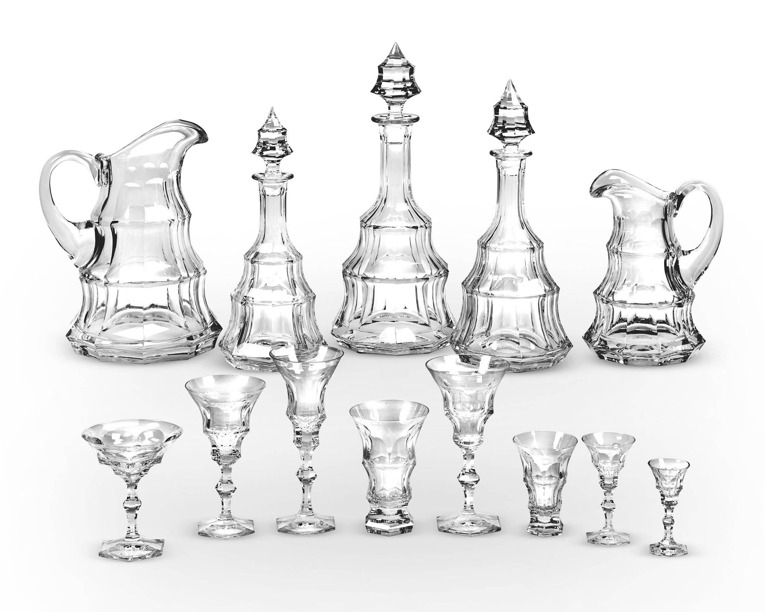 This monumental and luxurious 101-piece Bohemian crystal beverage service was crafted by the inimitable Ludwig Moser & Söhne glass company in the desirable Diplomat pattern. The service is a specimen in time-honored glass craftsmanship, with each