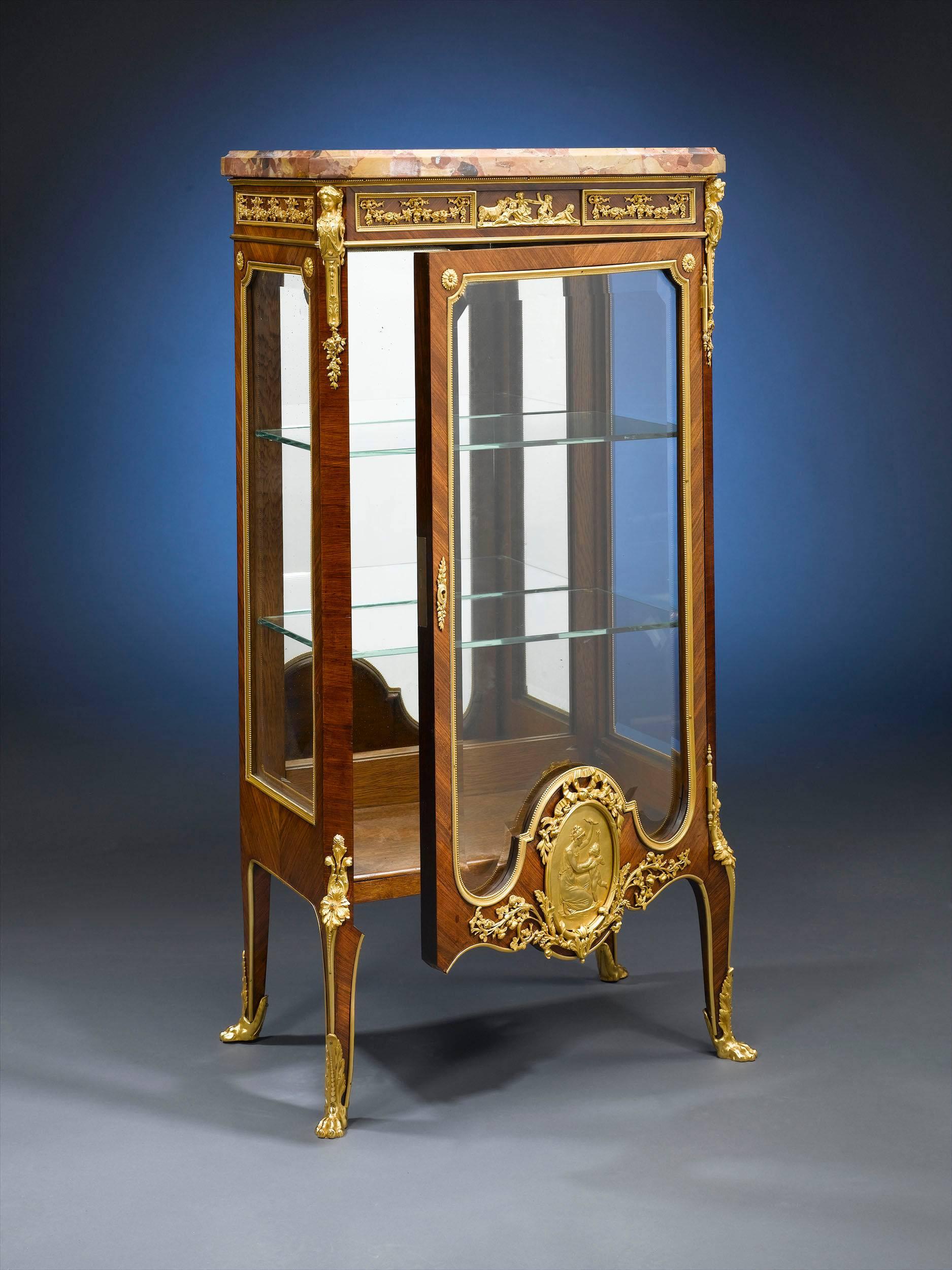 This exquisite kingwood and ormolu vitrine was crafted by François Linke, the finest and most renowned ébéniste of the 19th-early 20th centuries. Beautifully fashioned in the style of Louis XVI, this lovely display cabinet features intricate inlay