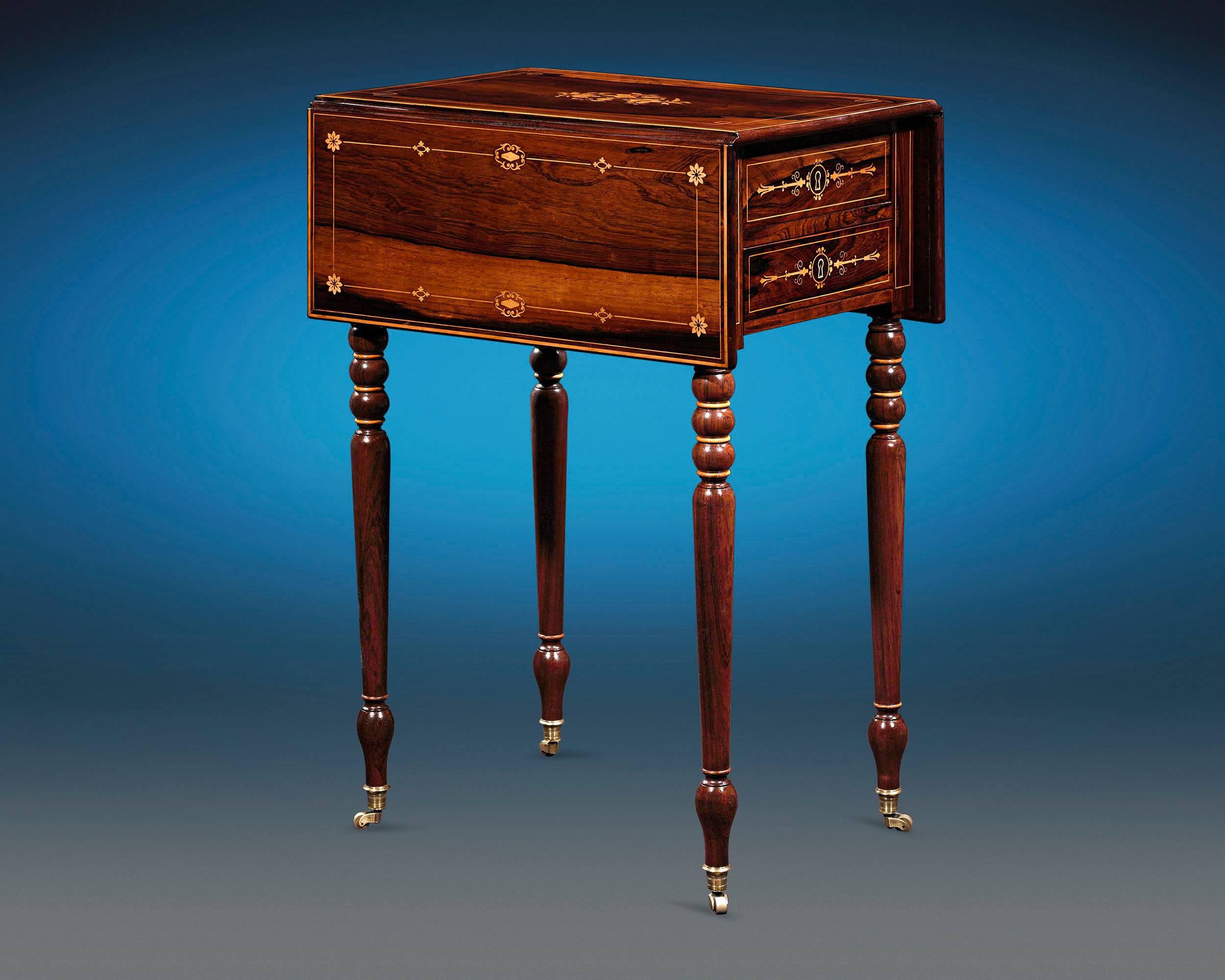 The beautiful marquetry of this French side table exemplifies the artistry and elegance of the Charles X period. Crafted for functionality as well as beauty, the perfectly proportioned table boasts hinged flaps that can be lowered when not in use.