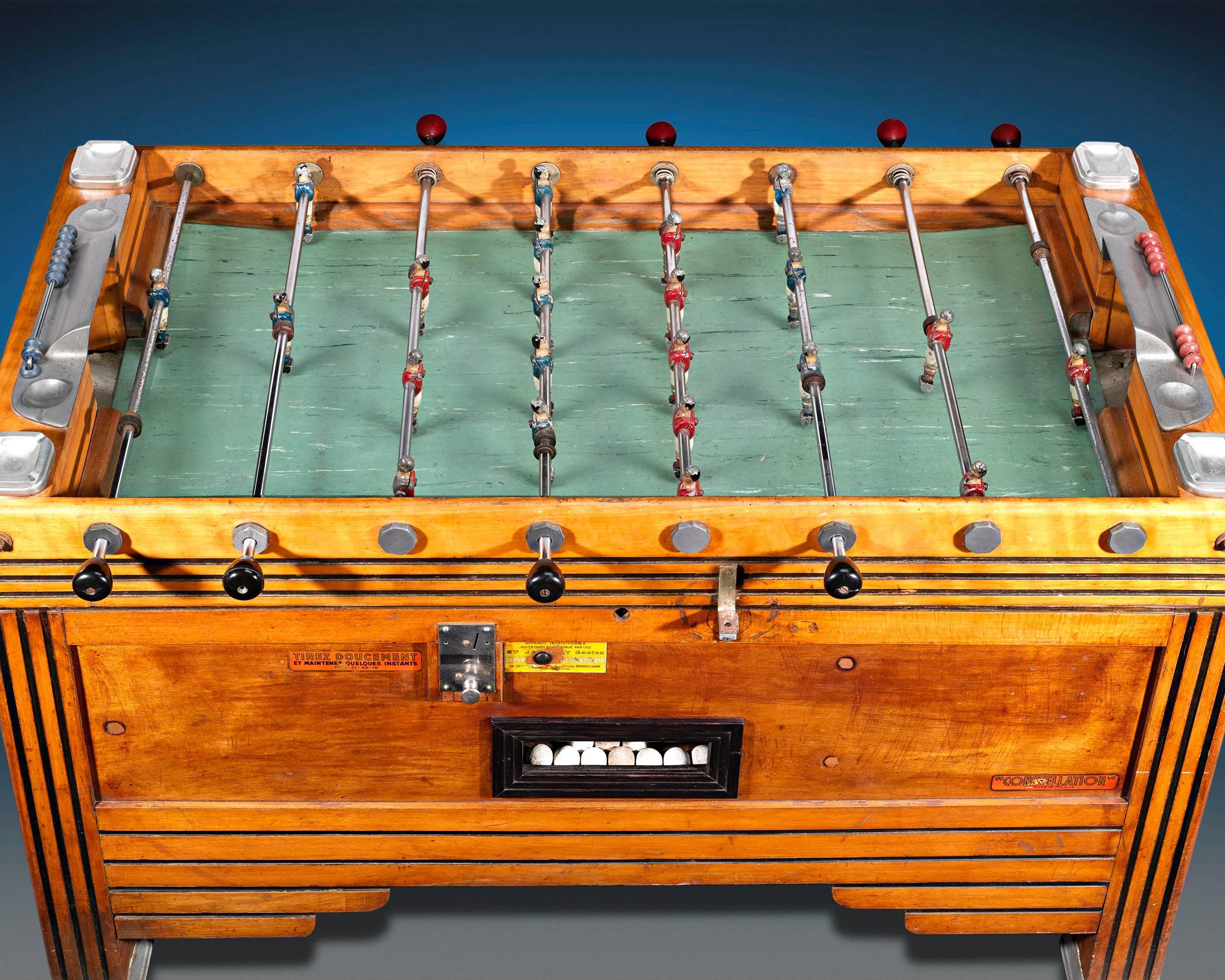 This delightful vintage foosball table is a wonderful and entertaining testament to the French obsession with soccer. The diverting machine is an iconic piece of French popular culture from the mid-20th century, a time when a foosball table could be