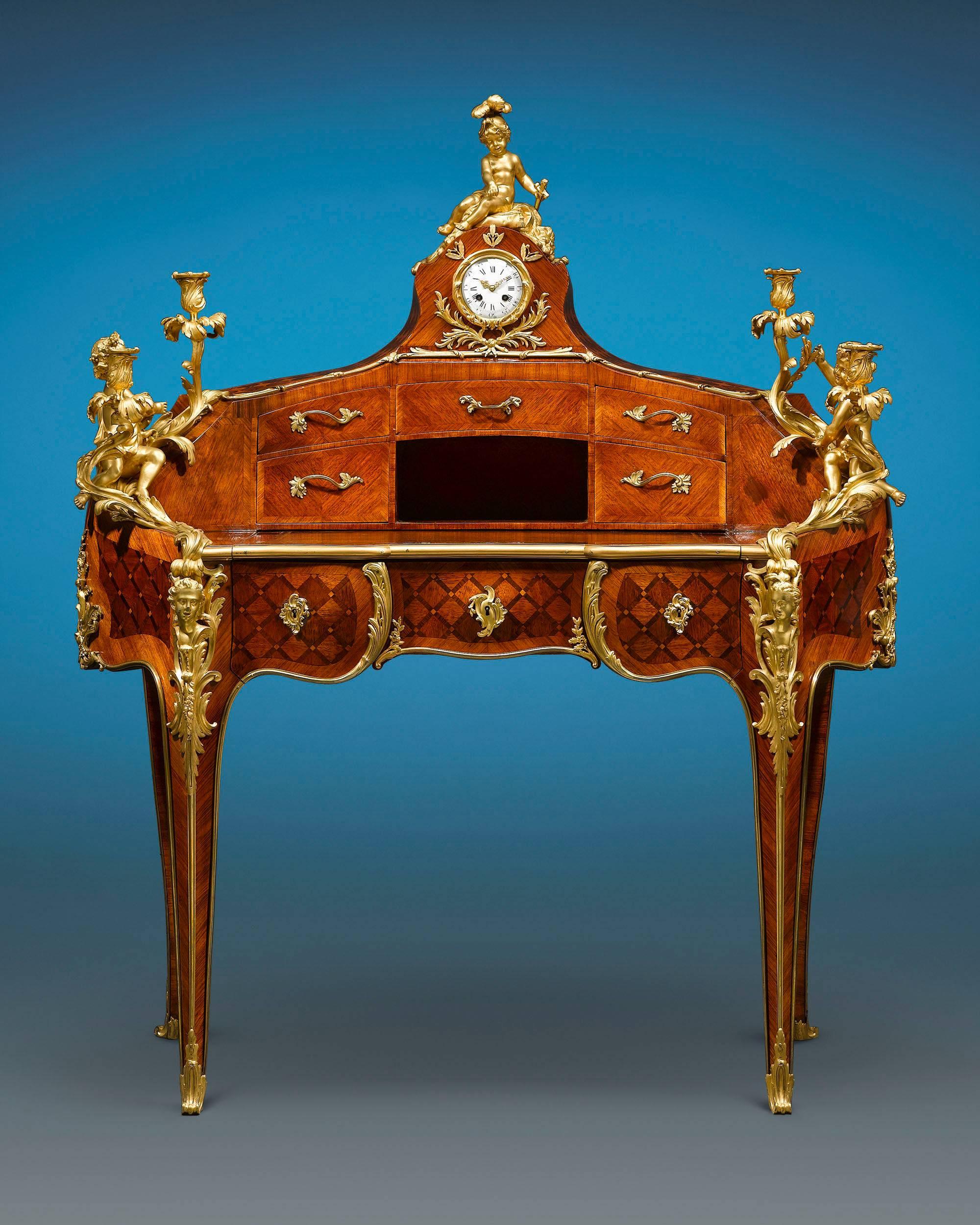 This fabulous and rare bureau à gradin, or tiered desk, was crafted by the highly respected ébéniste Theodore Millet of Paris, founder of the acclaimed Maison Millet firm. Displaying an outstanding rognon, or kidney shape, the desk is decorated