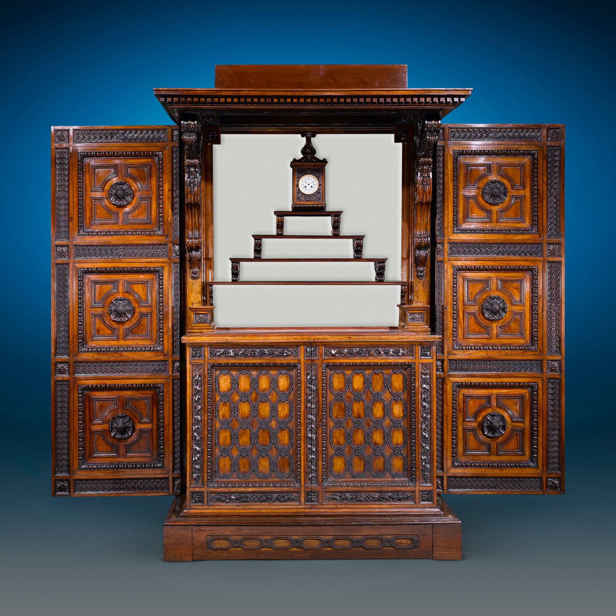 Majestic carving envelopes this amazing and monumental Italian cabinet crafted by the famed Angiolo Barbetti of Florence. A leading figure in Italian woodworking during the 19th century, furnishings by Barbetti are truly precious finds. A cabinet of