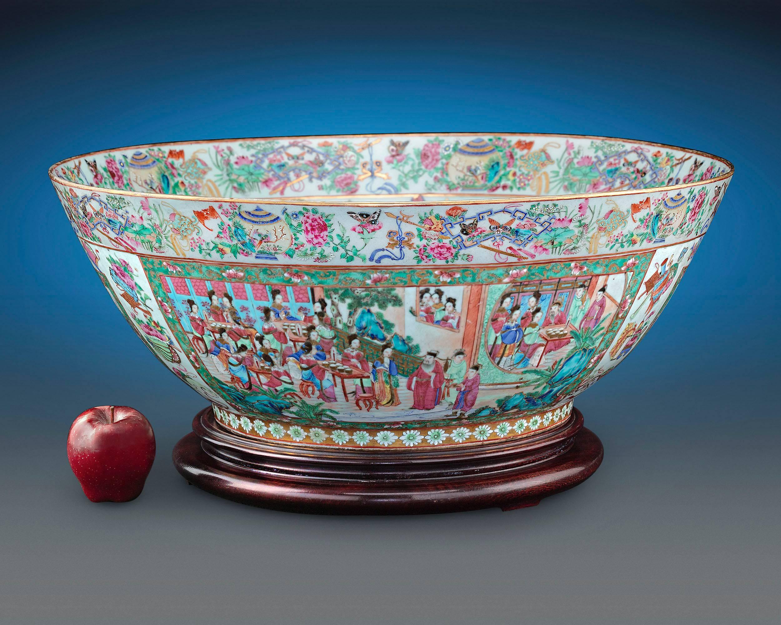 This beautiful and rare Chinese export rose medallion bowl exhibits magnificent artistry and detail. The vessel is adorned with highly detailed hand-painted scenes of courtly life surrounded by an abundance of flowers, birds, butterflies and fruit.