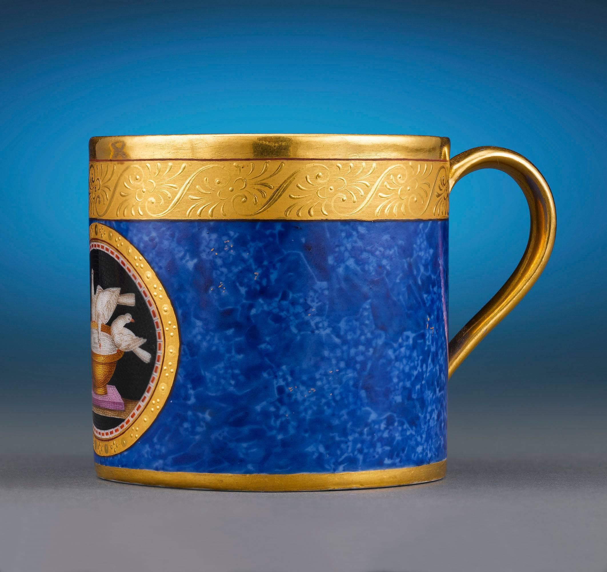 This exceptional KPM Berlin coffee cup and saucer features some of the most technically demanding painting and skilful imitation of precious stones ever created by the renowned porcelain manufactory. Featuring an intricate hand-painted design in the