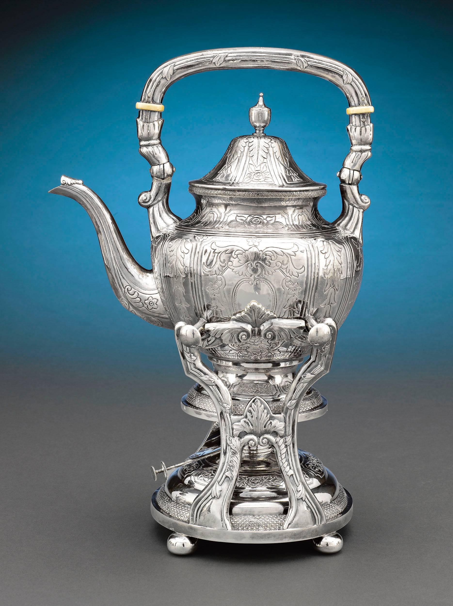 This stunning and complete seven-piece Chinese export silver tea and coffee service was crafted by Yu Chang of Shanghai and Hong Kong, a firm renowned for its unique and high-quality creations. Comprising a hot water kettle and stand, tea pot,