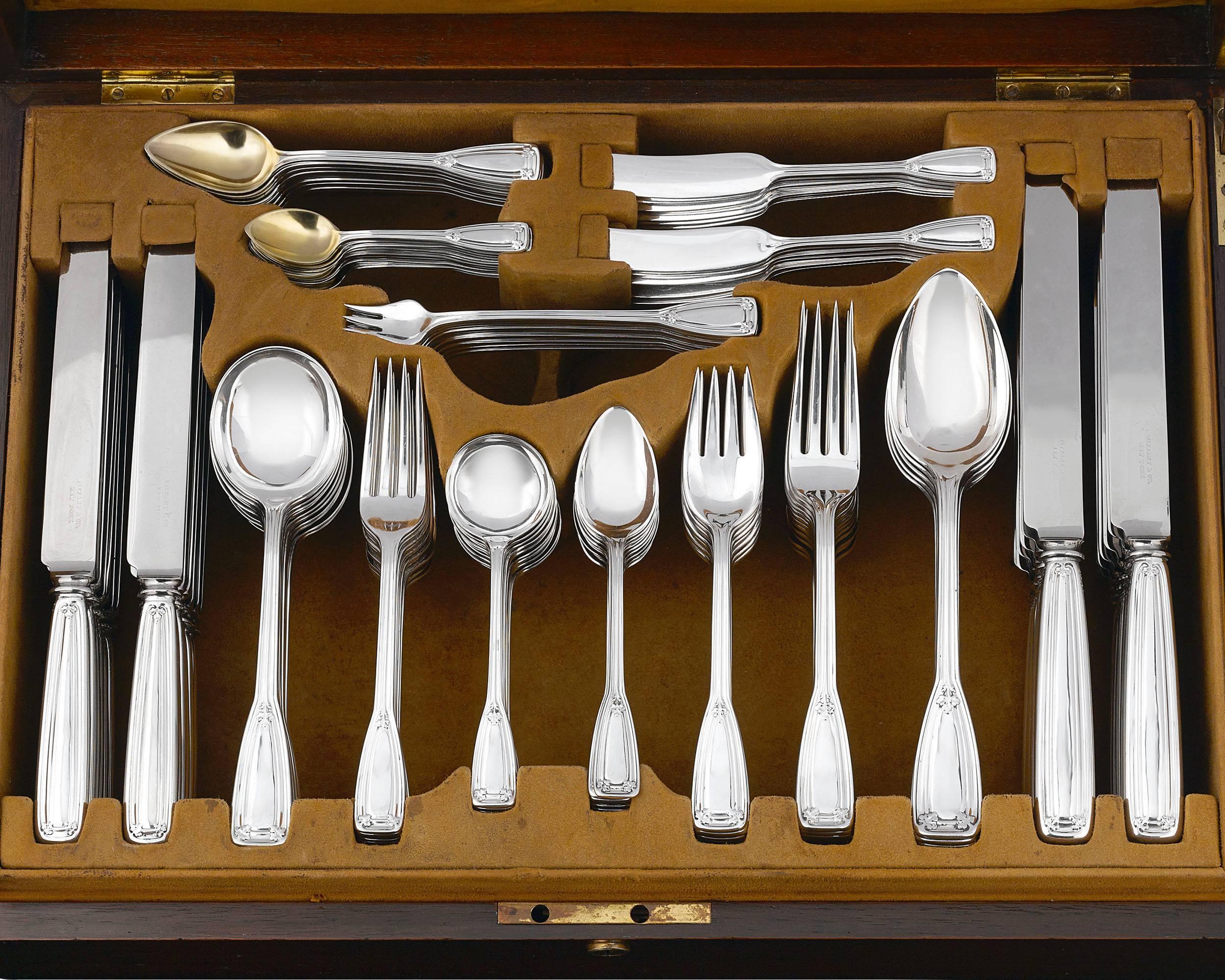 This exquisite 150-piece sterling silver flatware service for 12 was crafted by Tiffany & Co. in the timeless St. Dunstan pattern. The classic Art Deco design is named for St. Dunstan, the patron saint of gold and silversmiths. It exhibits a