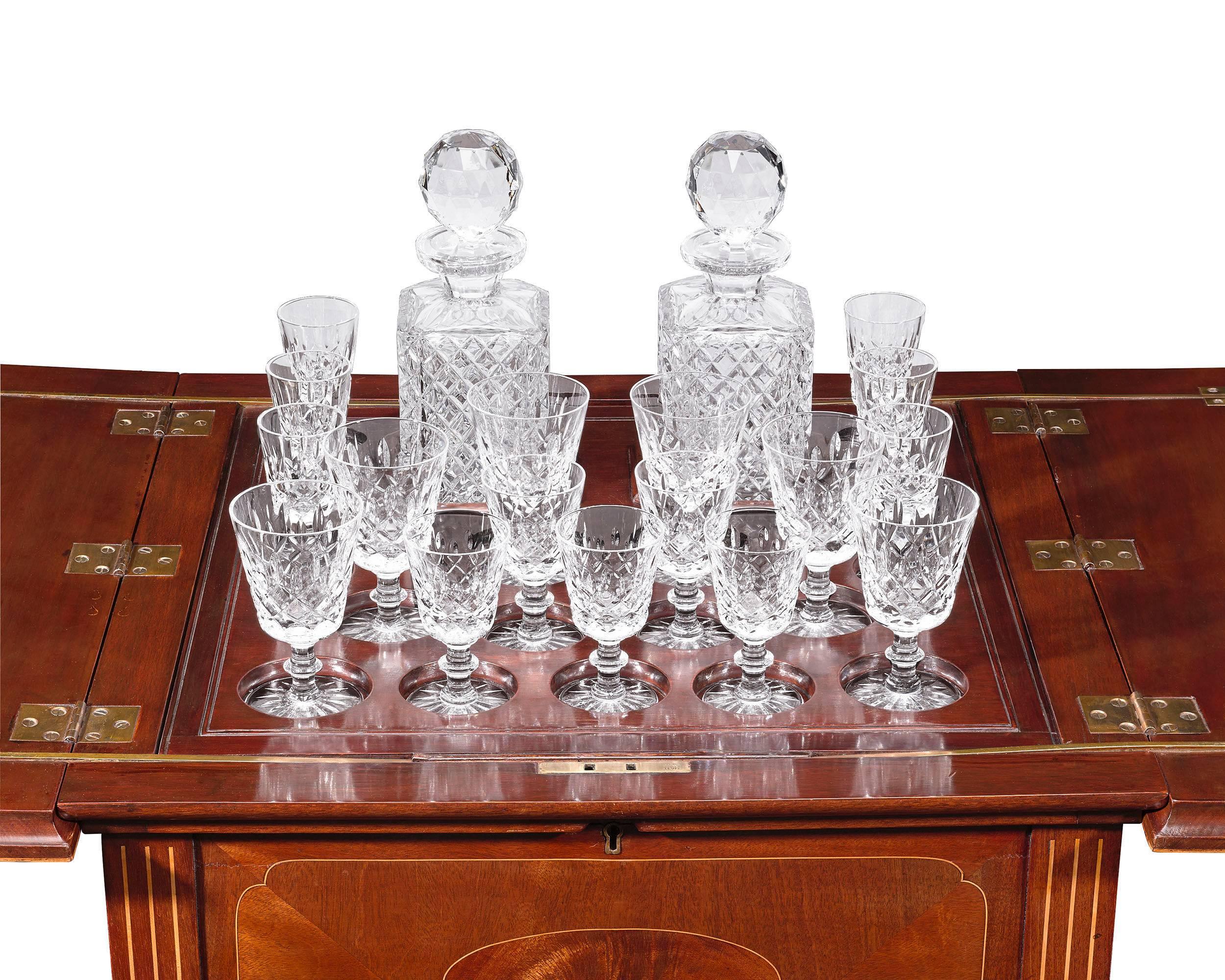 This outstanding, ingeniously designed bar brings style to any cocktail party. Also known as a 