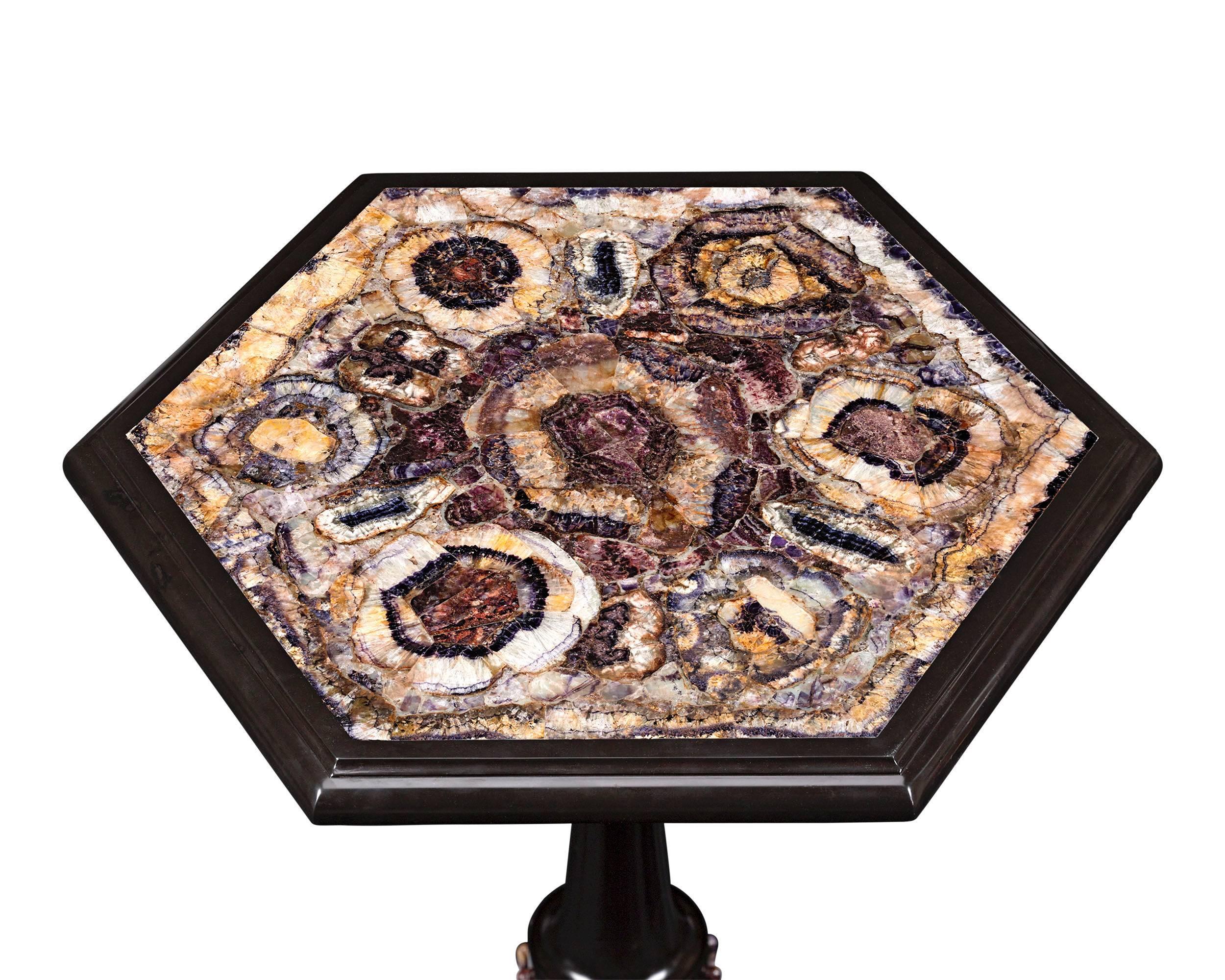 The inset surface of this superb Victorian-period tripartite table bears a stunning example of Derbyshire Blue John, one of the rarest and most coveted minerals in the world. The exceptional design showcases the unique qualities for which Blue John