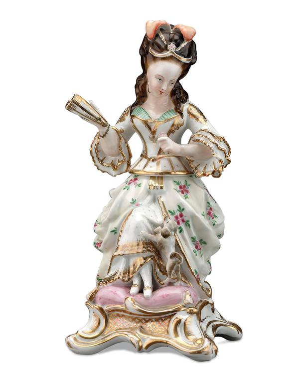 A wonderful old Paris porcelain veilleuse of a marquise with a dog. These wonderful porcelain wares were once used for keeping drinks and foods warm for those who were bed ridden. A similar veilleuse is pictured on page 135 of Harold Newman's book,