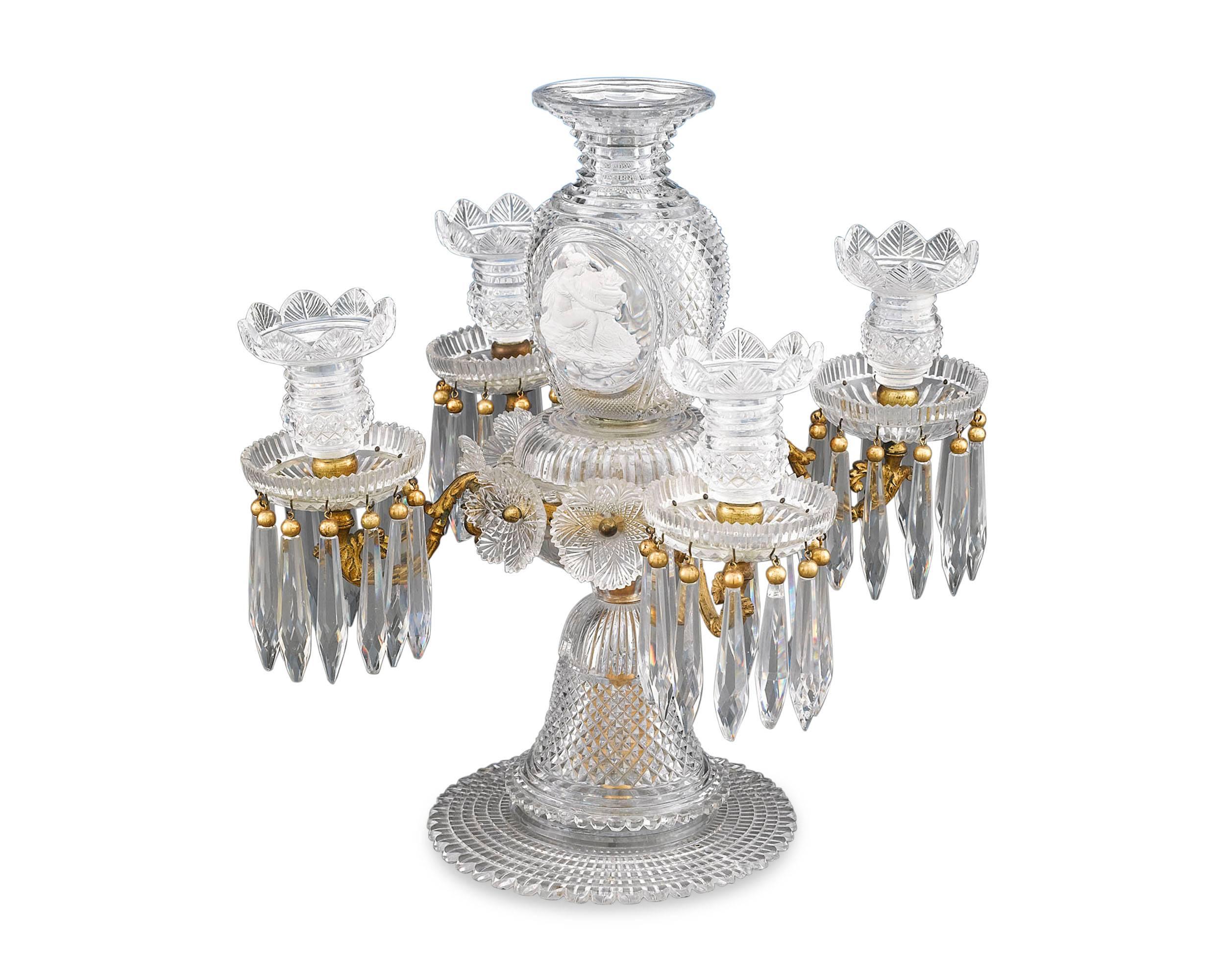 This exceptional and rare four-light cut-glass centerpiece by the renowned Apsley Pellatt is a work of tremendous skill and artistry. A symphony of delicate diamond-cut-glass, this light is topped with a flower vase center enclosing an intricate