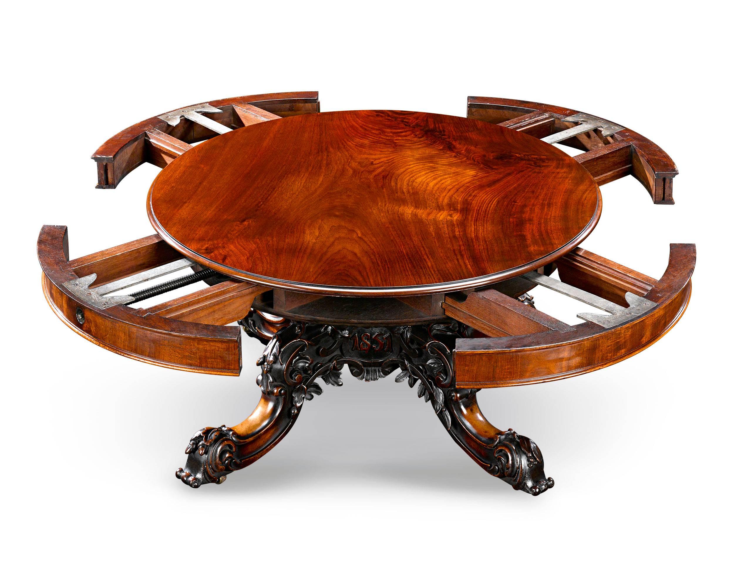 A masterpiece of both cabinetmaking and mechanical engineering, this one-of-a-kind expanding table was crafted by the renowned cabinetmaker Samuel Hawkins of London for the Great Exhibition of 1851. Diminutive in size, the fascinating table was