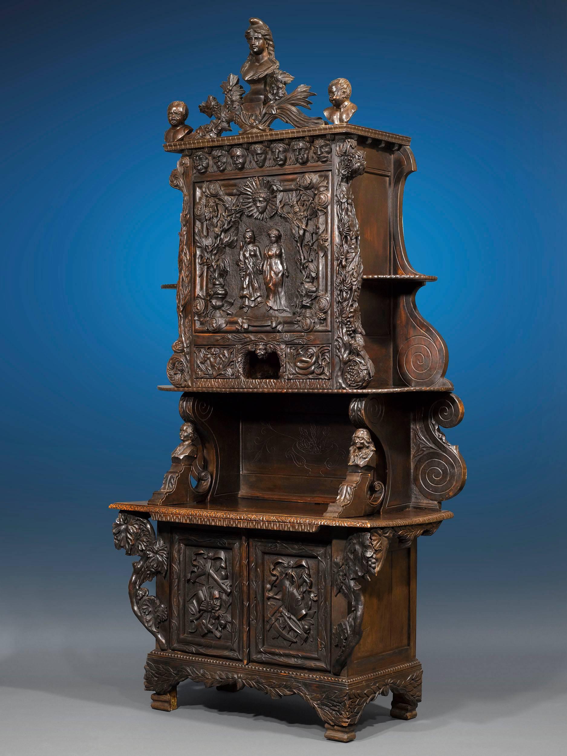 This beautifully carved America-France Liberty cabinet was created for the Louisiana State Exhibit at the 1904 St. Louis World’s Fair, also known as the Louisiana Purchase Exposition. Crafted of walnut, this cabinet celebrates both the special