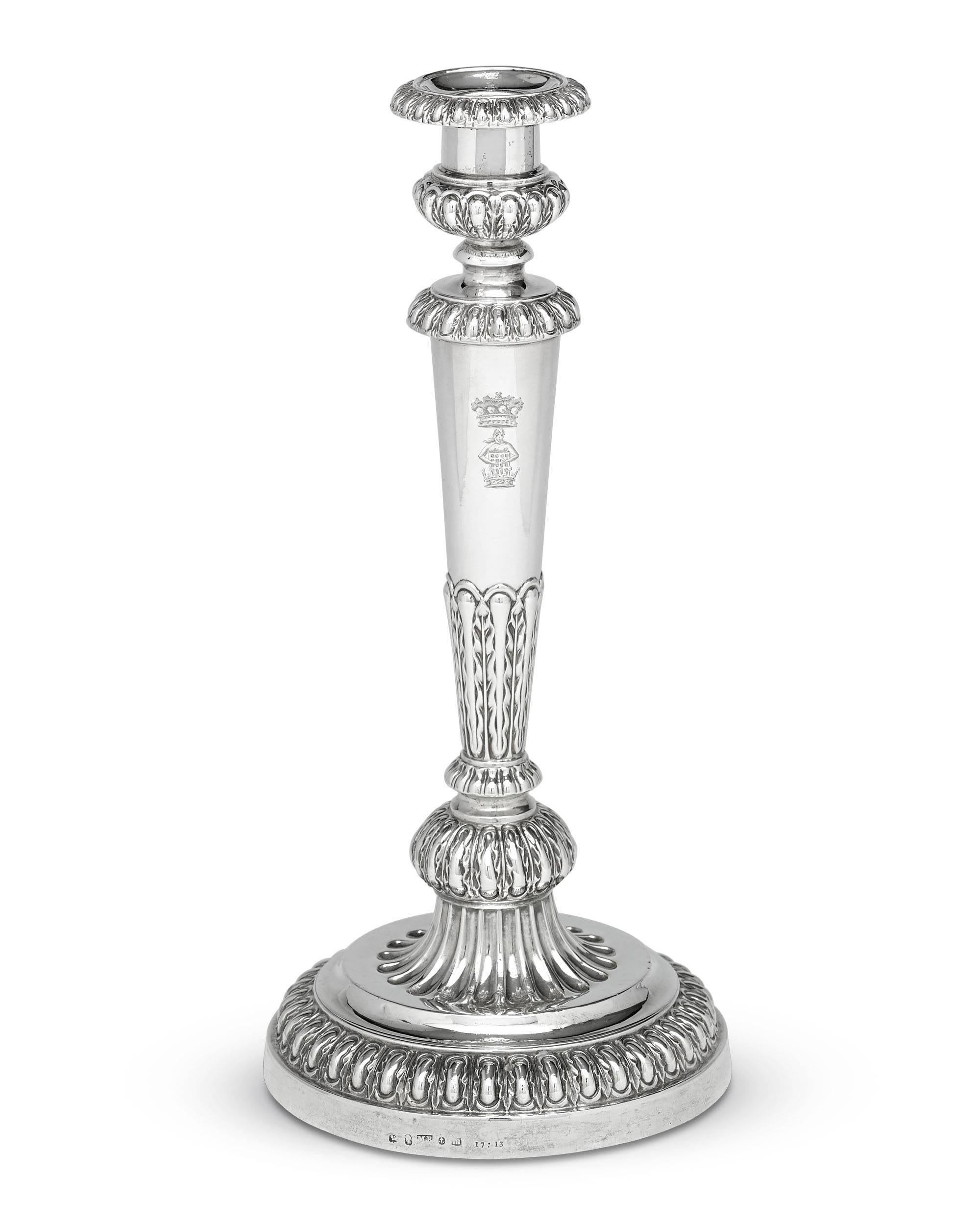 This rare and important set of four George III-period silver candlesticks were created by the renowned silversmith Matthew Boulton. Sterling works by Boulton are a rarity, especially those exhibiting the superior workmanship seen in the present