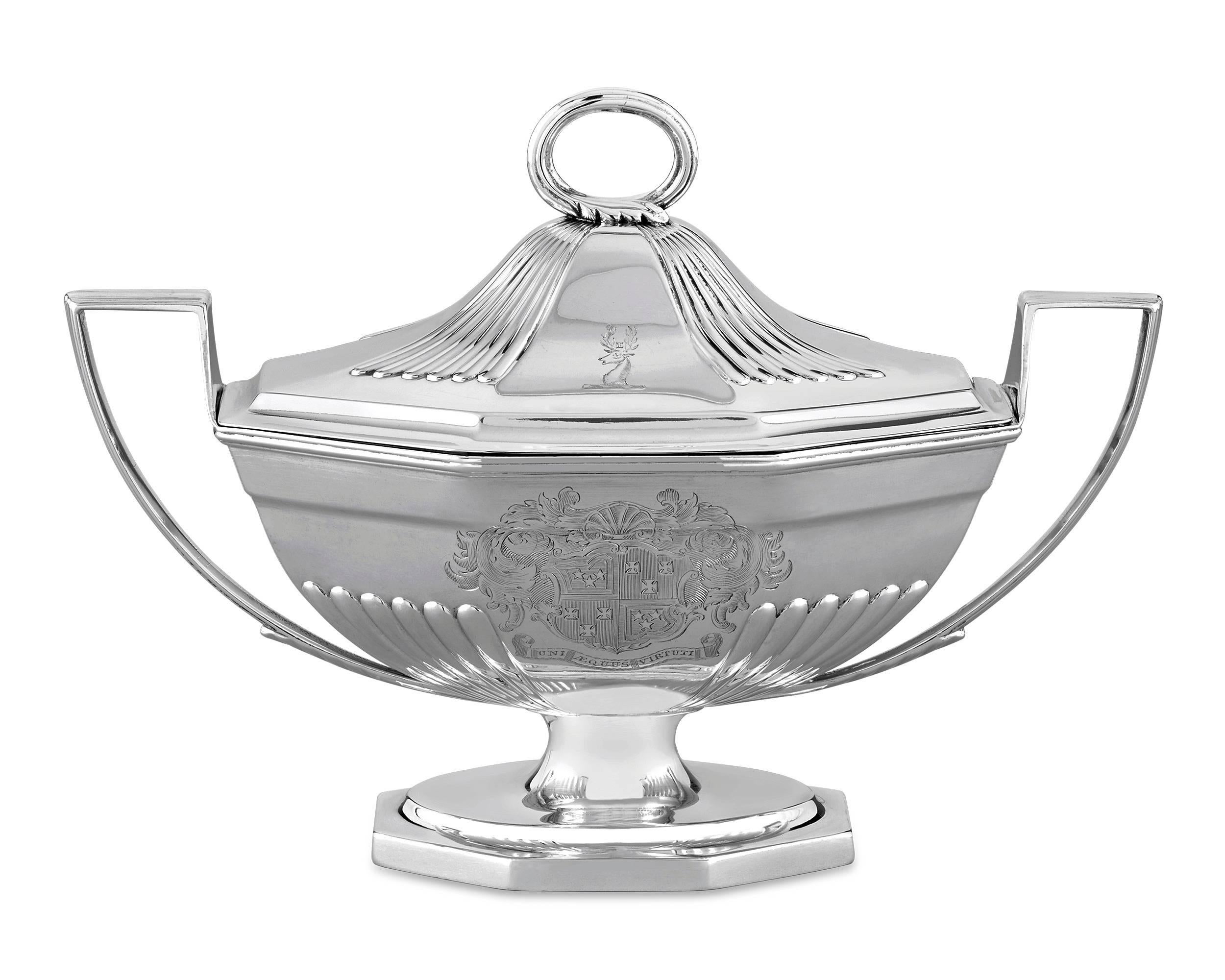 This rare and exceptional pair of silver sauce tureens was crafted by the legendary Georgian silversmith Paul Storr. Complete with their original matching covers, the tureens are striking examples of the neoclassical style that pervaded late