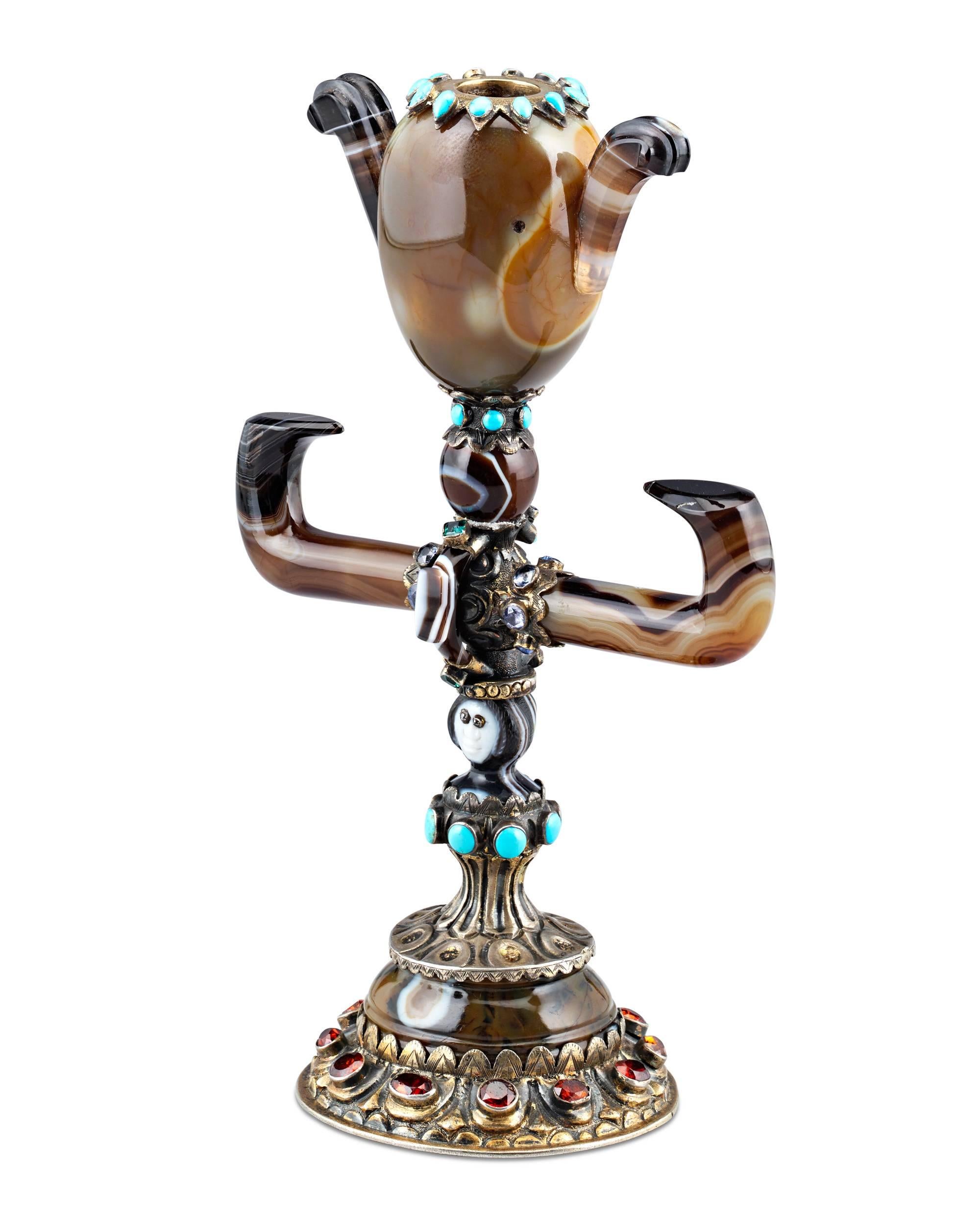 Masterfully handcrafted with clear influences of Chinese culture, this rare and unique agate and jeweled vase demonstrates Viennese command of the decorative arts.

Crafted of carved and polished agate in a wonderful display of artistry, this