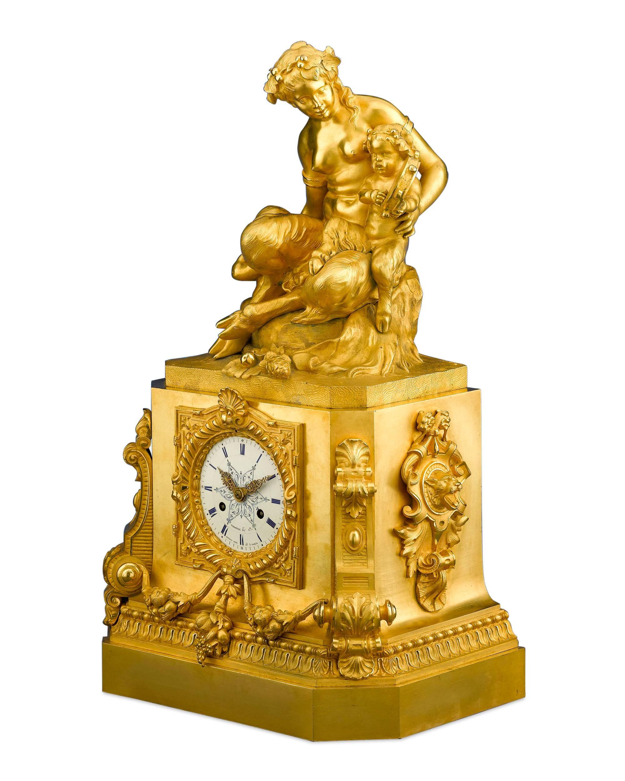 A female satyr enjoys music played by two young fauns in this remarkable gilt bronze mantel clock by bronzier Thomire & Cie and clockmaker Louis Moinet. The body, crafted by Pierre-Philippe Thomire, is a celebration of classical forms, with its