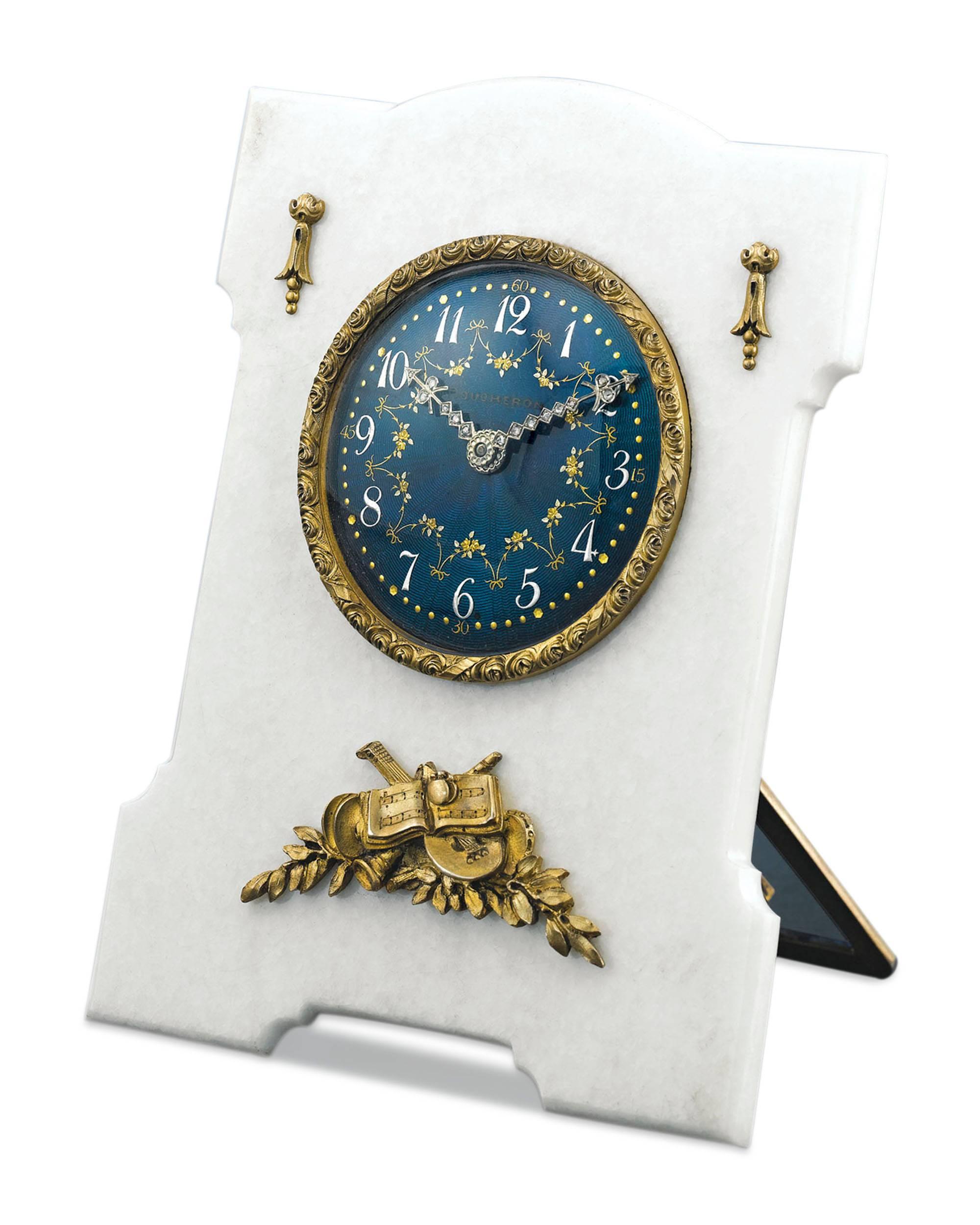 This remarkable desk clock by Boucheron is a beautiful objet d’art by one of the most famous names in luxury. The timepiece is crafted of a solid white marble, silver, bronze and exquisite guilloché enamel. Housed in its original fitted case, this