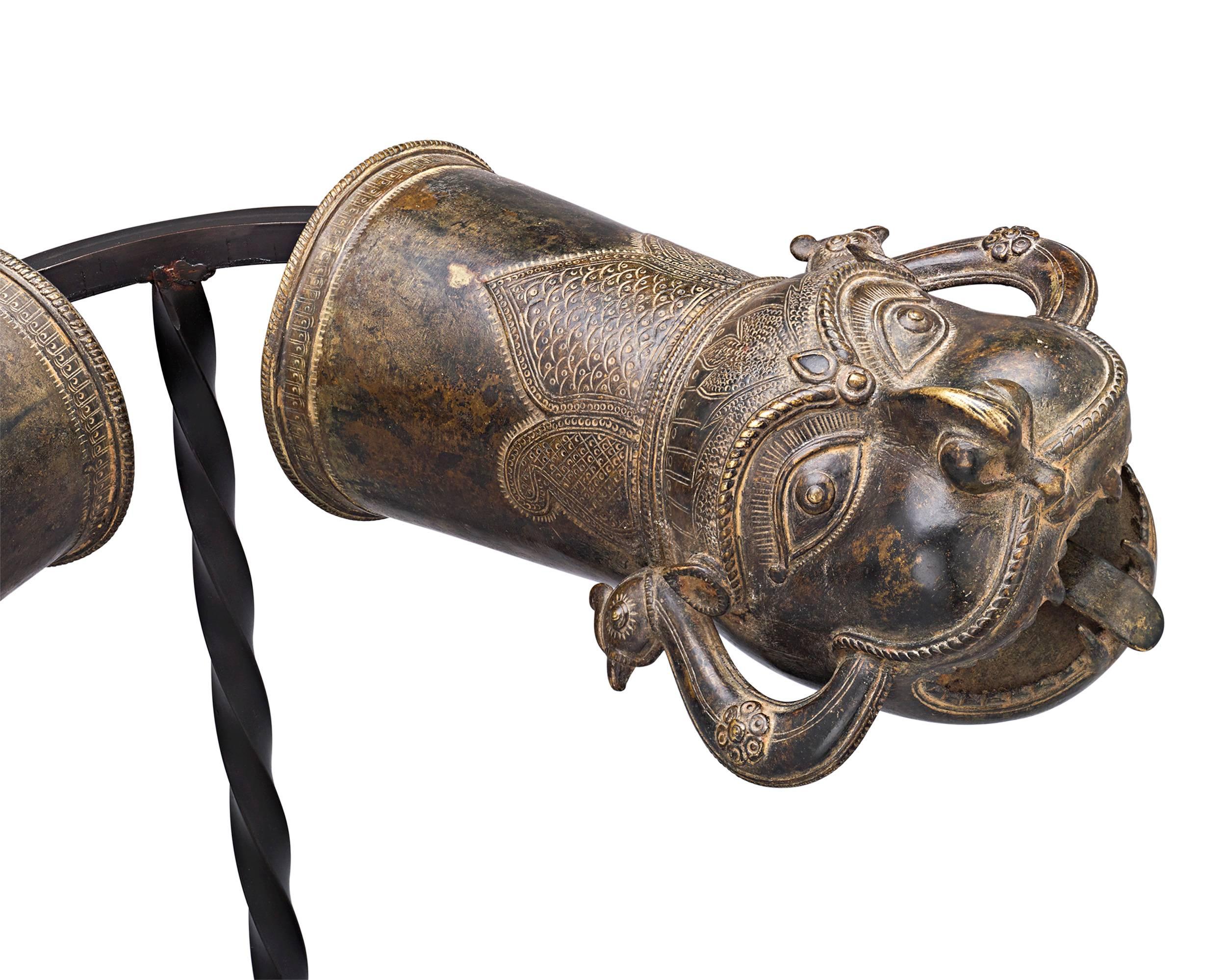 Beautifully stylized and crafted in the form of protective mythological creatures are these exceptional 18th-century Indian bronze palanquin finials. Palanquin, or “palki”, are litter-type conveyances that have been in use in India for centuries.