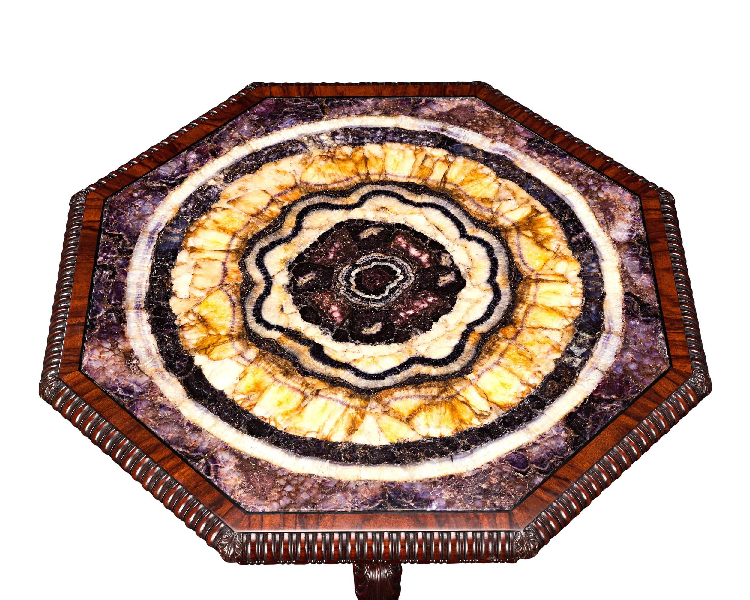 A one-of-a-kind masterpiece, this impressive table is almost certainly the finest piece of blue john furniture ever crafted. The star of the table is undoubtedly the monumental slab of Derbyshire blue john that is set at its center. One of the most