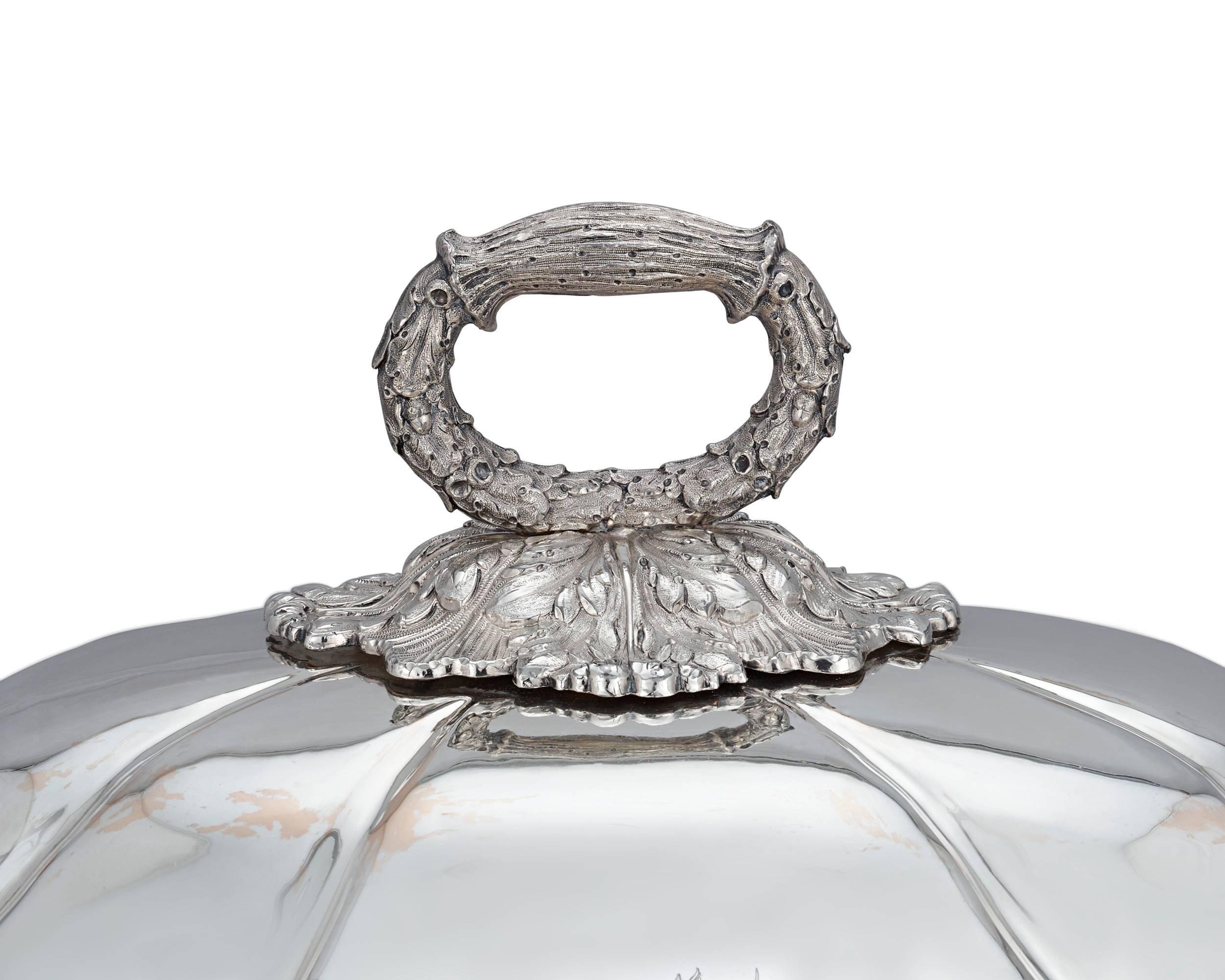This grand venison meat dish is masterfully crafted of fine Old Sheffield silver plate. A product of Regency ingenuity, this dish is crafted with the utmost intricacy in a manner one would expect from a sterling counterpart. The rich acanthus leaf