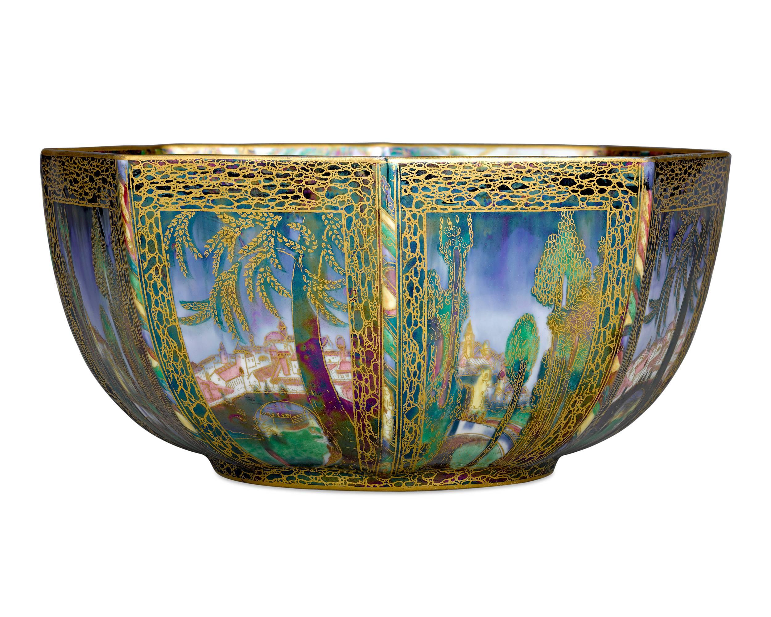 This exquisite bowl by Wedgwood is an extraordinary example of the renowned firm’s enchanting Fairyland Lustre collection. Exhibiting fiery colors and scenes from a fantastical world, the octagonal design features a beautiful combination of the